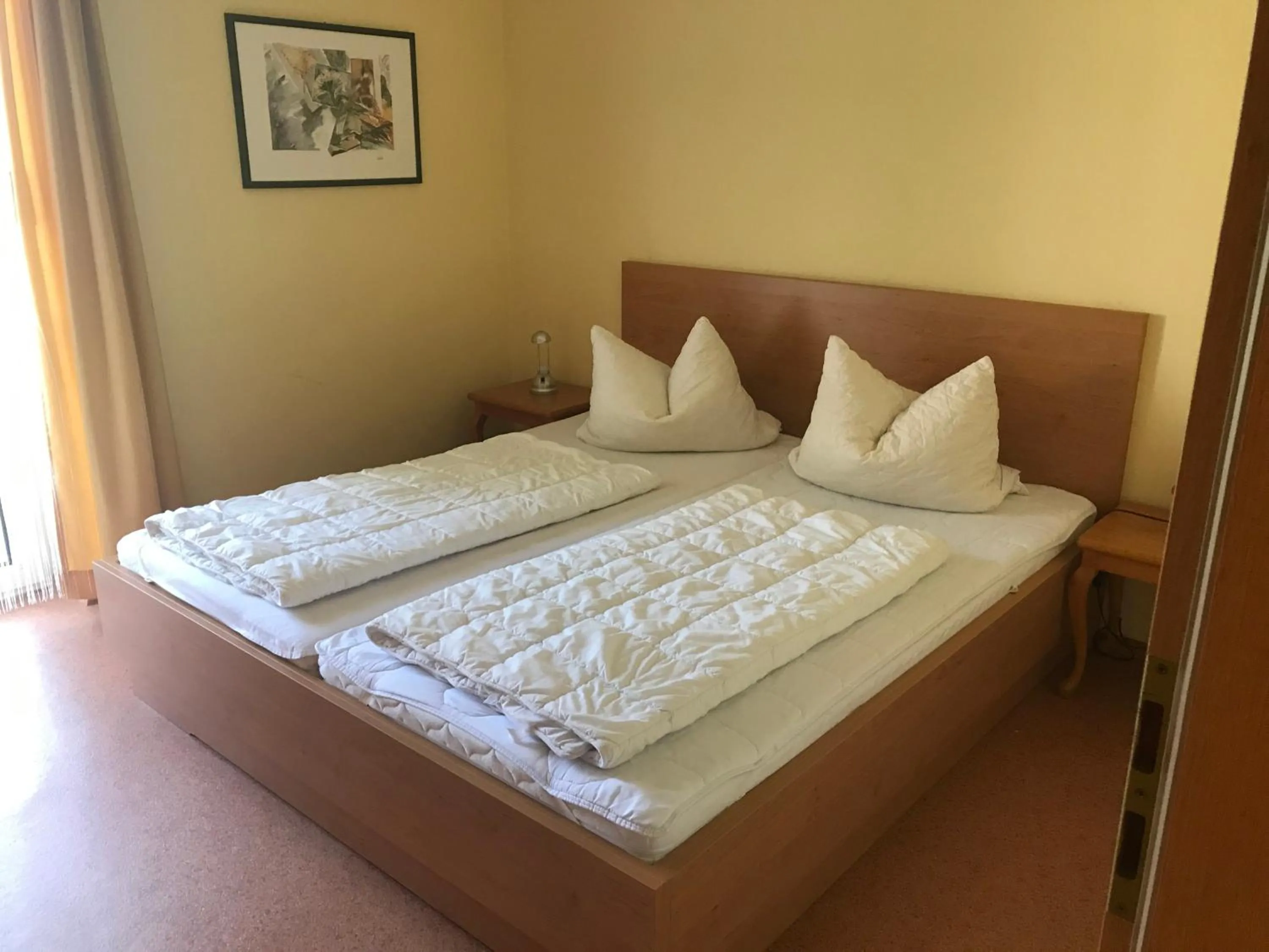 Bed in Ferienresidenz Am weißen Regen