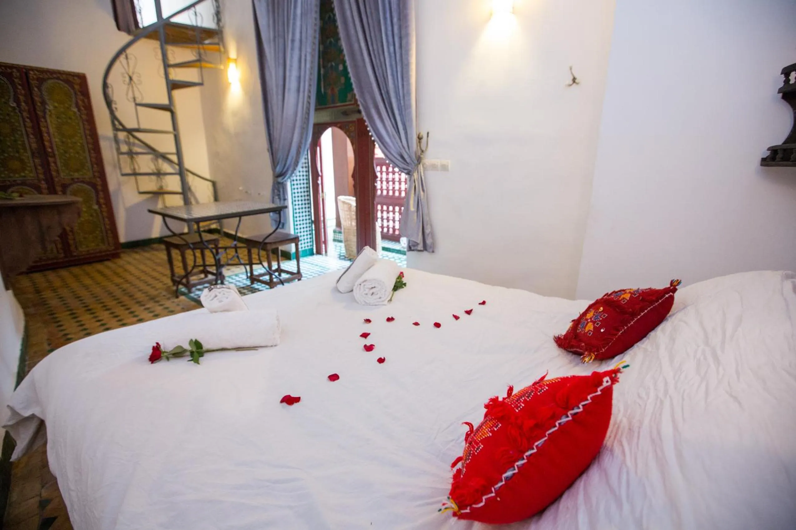 Bed in Riad Zina Fes - Elegance in the Heart of Fes