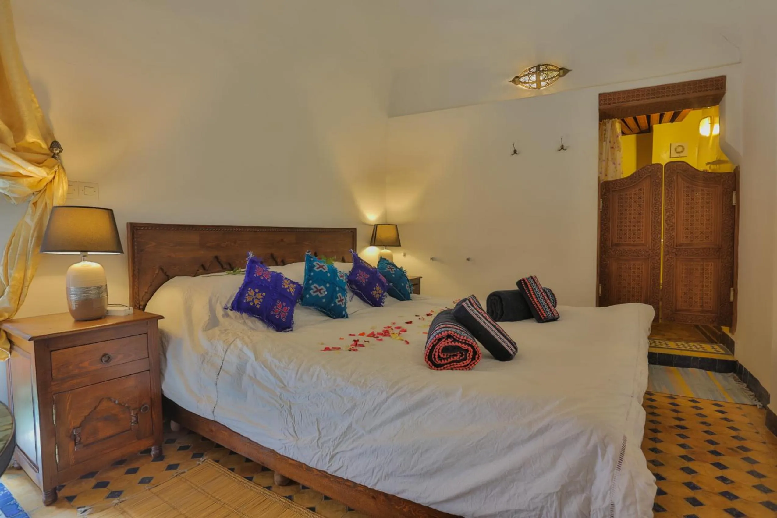 Bed in Riad Zina Fes - Elegance in the Heart of Fes