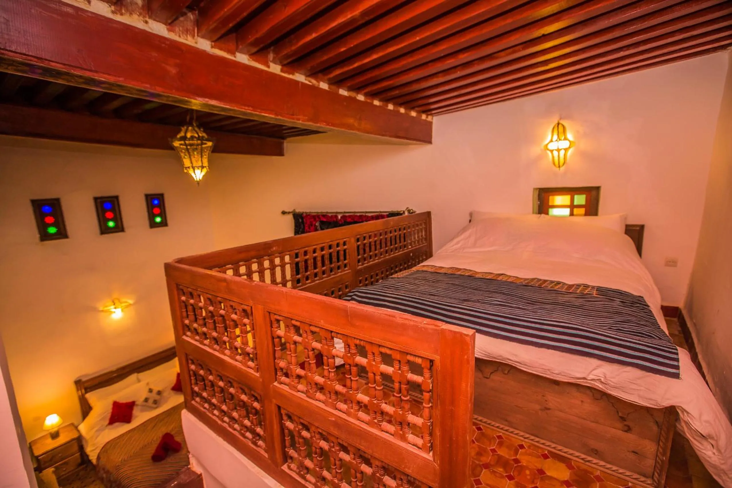 Bed in Riad Zina Fes - Elegance in the Heart of Fes