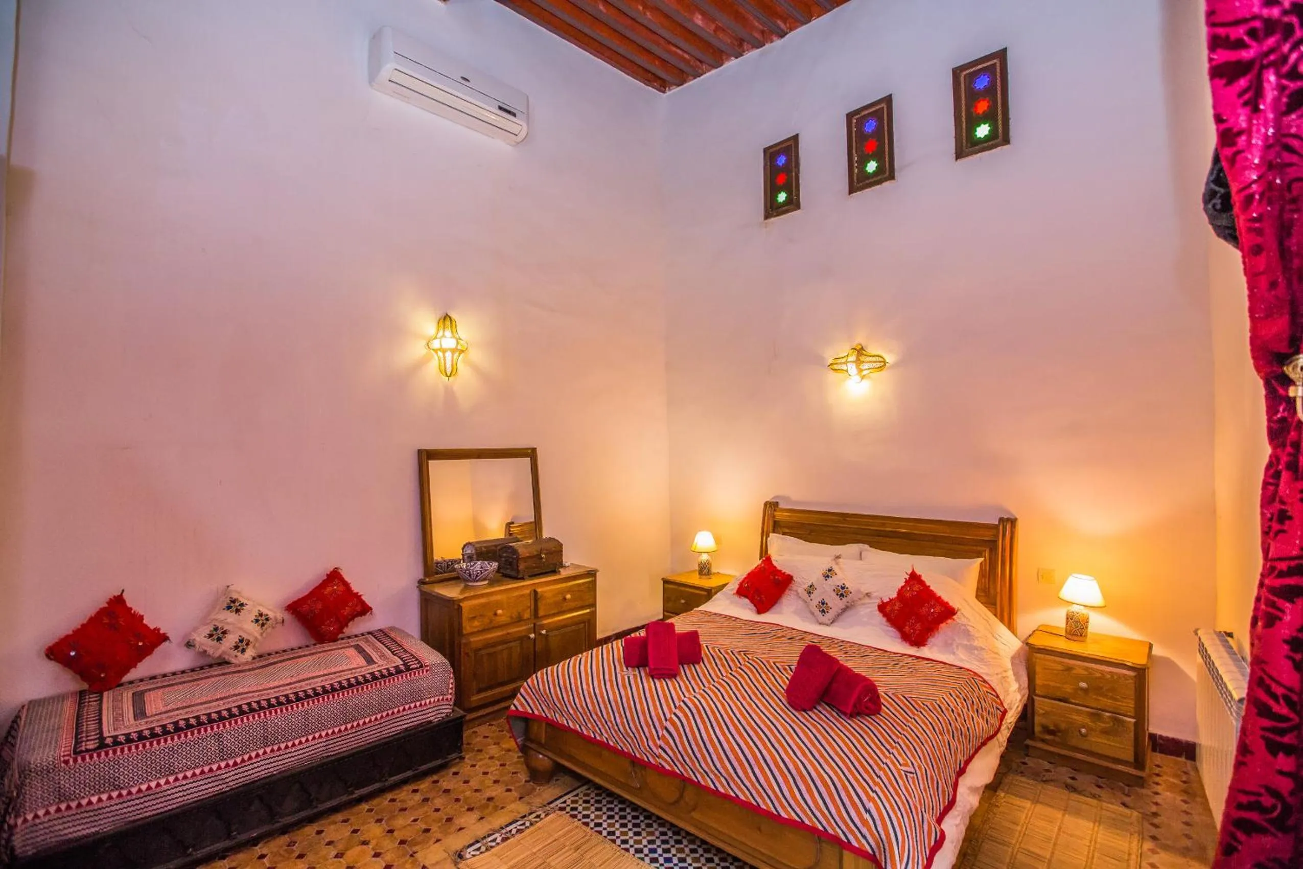 Bed in Riad Zina Fes - Elegance in the Heart of Fes