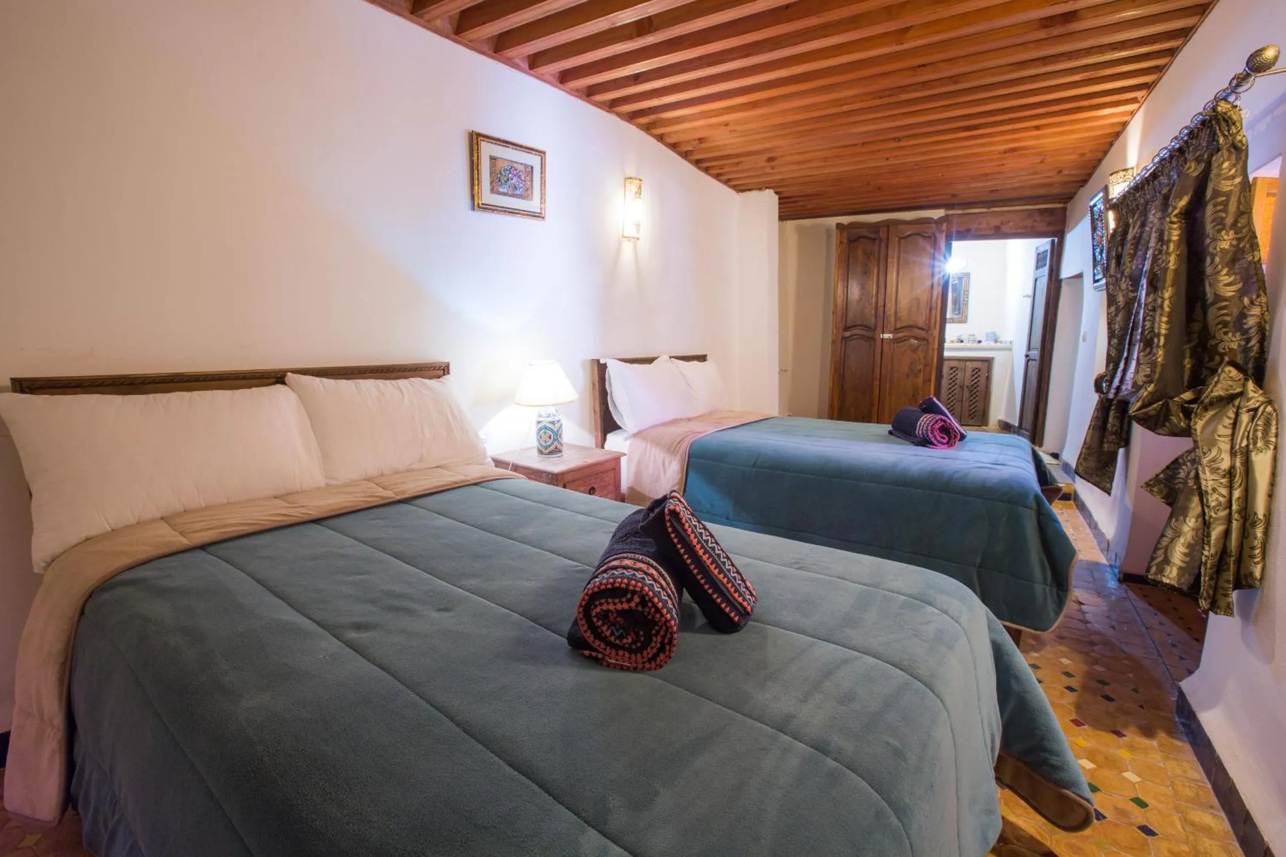 Bed in Riad Zina Fes - Elegance in the Heart of Fes