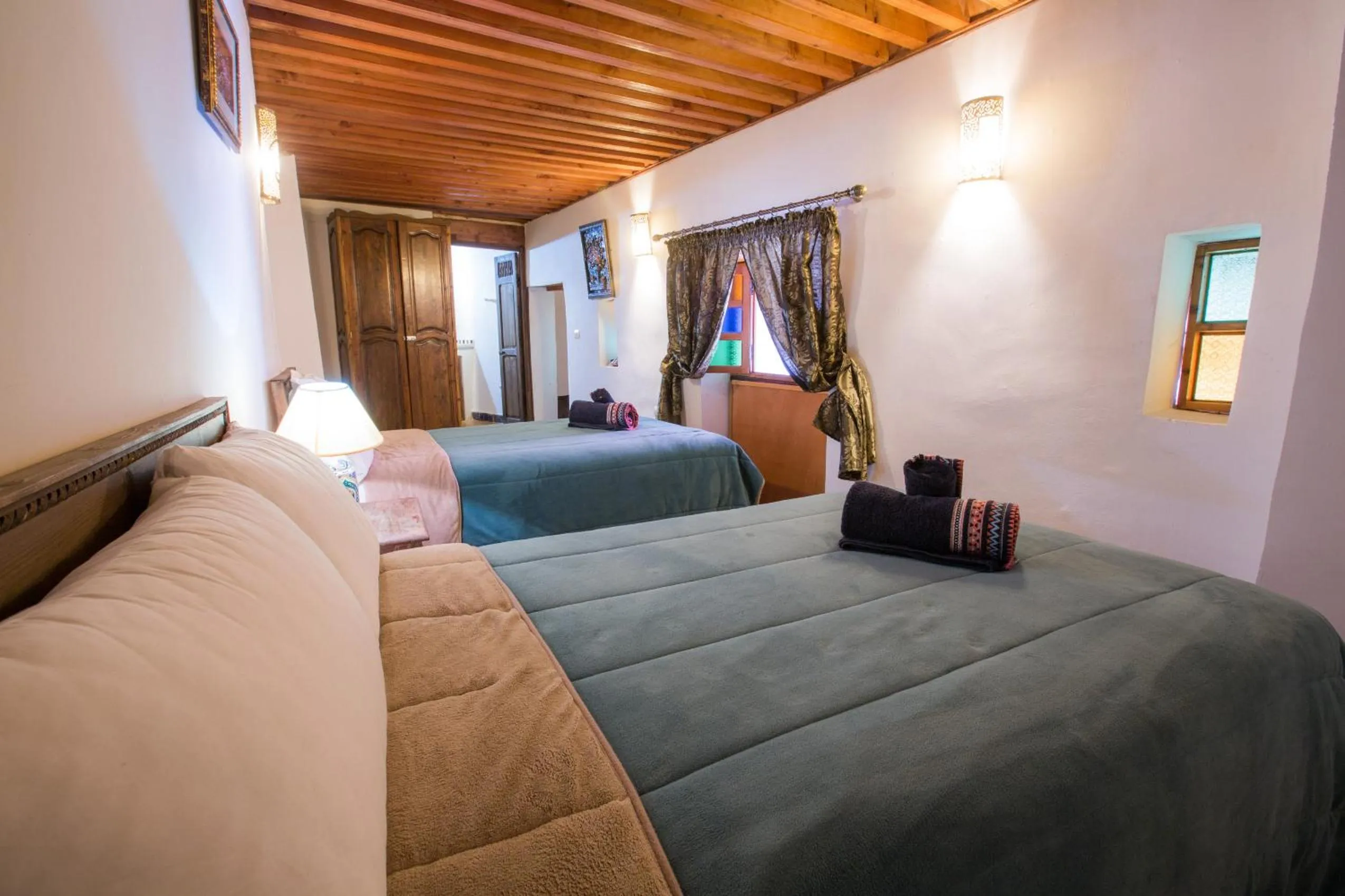 Bed in Riad Zina Fes - Elegance in the Heart of Fes