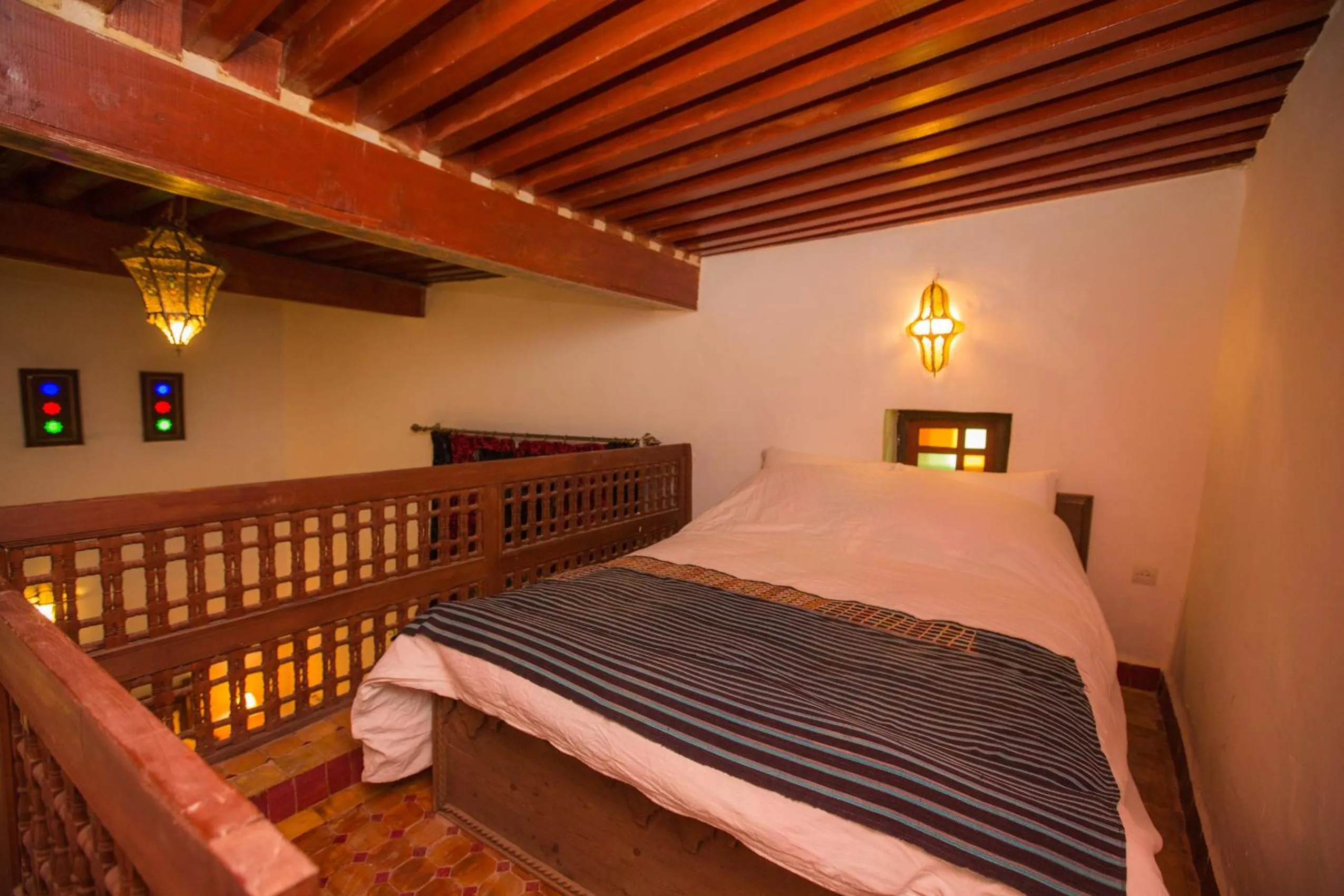 Bed in Riad Zina Fes - Elegance in the Heart of Fes