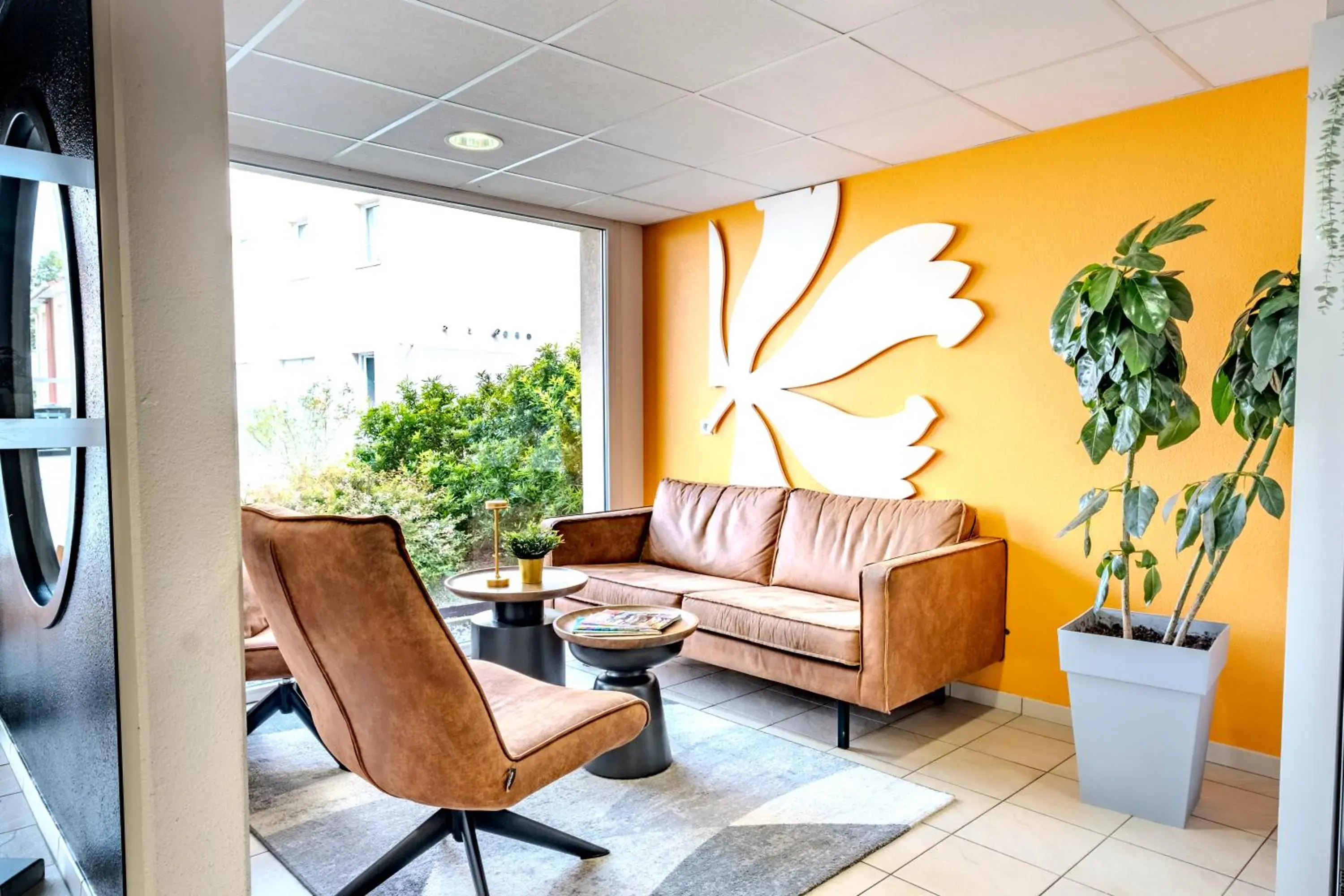 Living room in Première Classe Roissy - Aéroport CDG - Le Mesnil-Amelot Living room in Première Classe Roissy - Aéroport CDG - Le Mesnil-Amelot