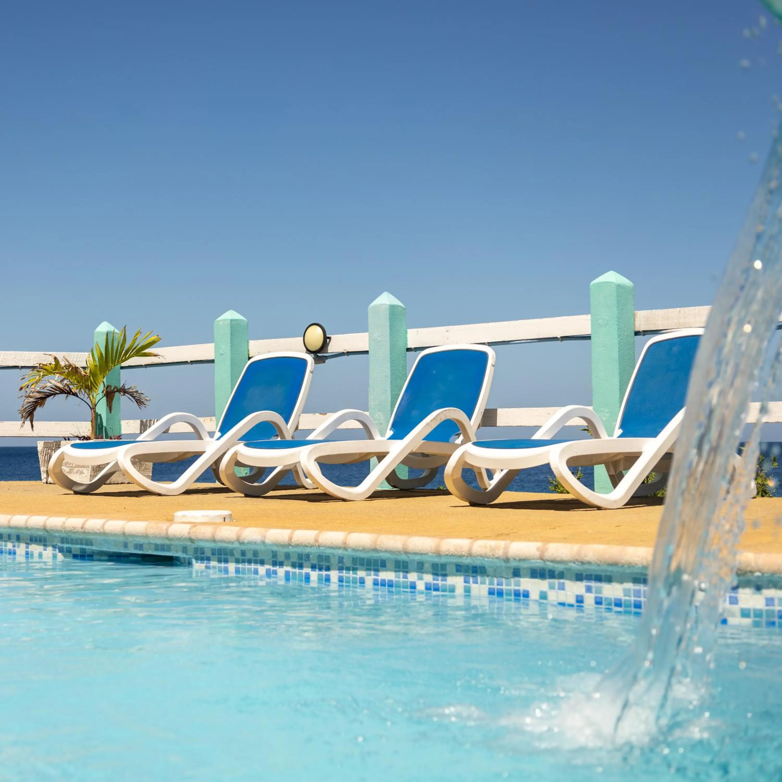 Swimming pool in Seagrape Plantation Resort & Dive Center