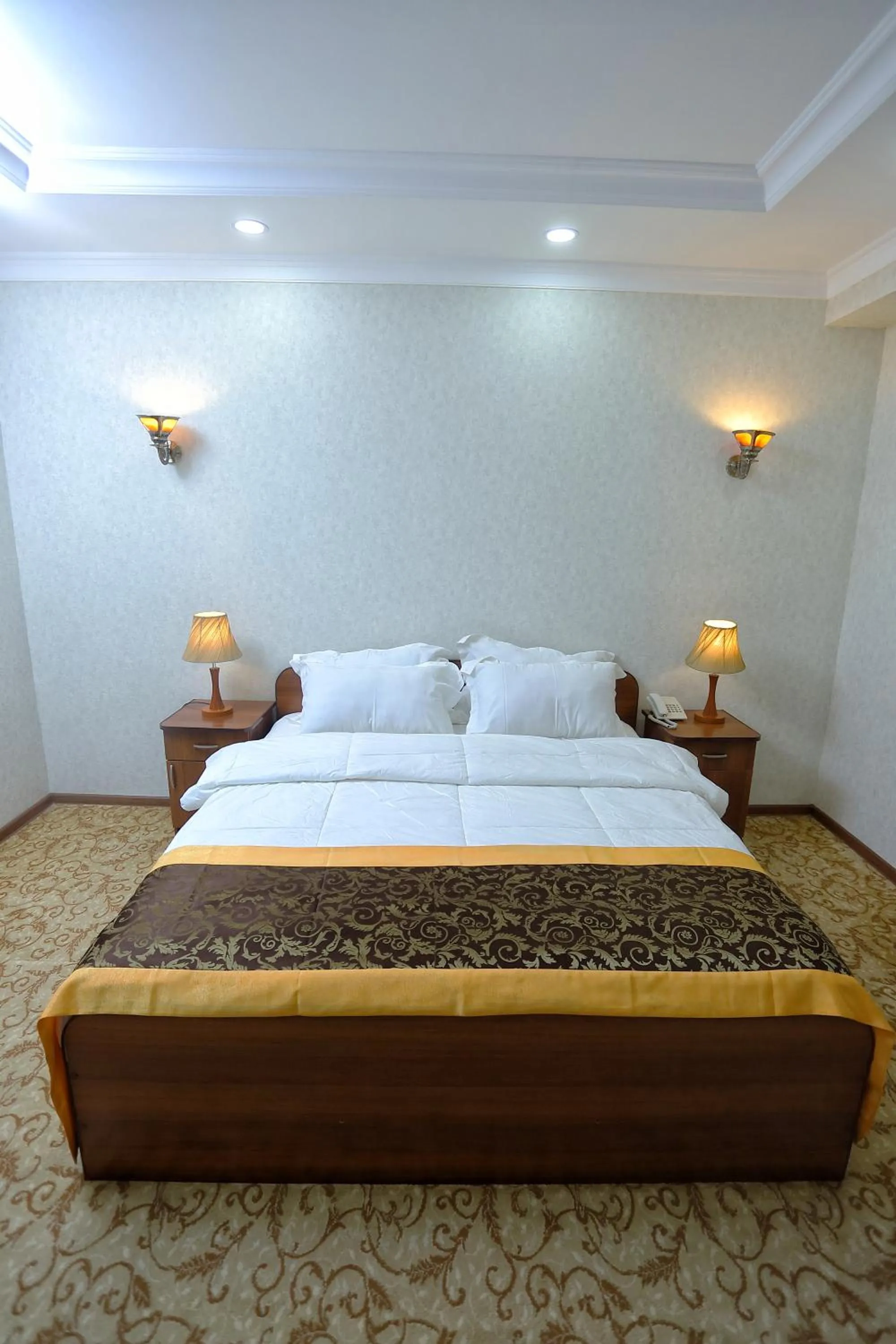 Bed in VIARDO Hotel
