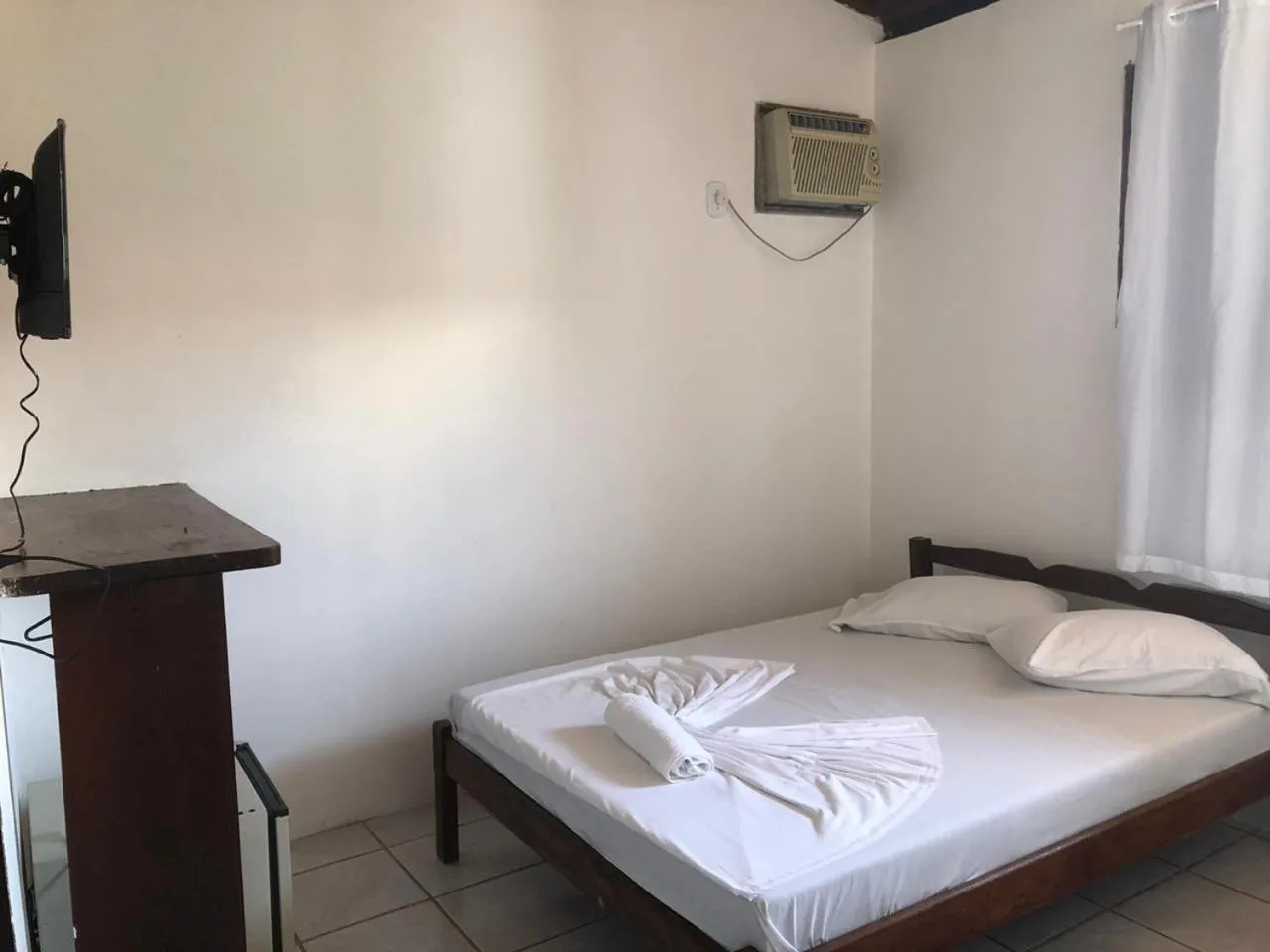 Bed in Pousada Rancho Verde