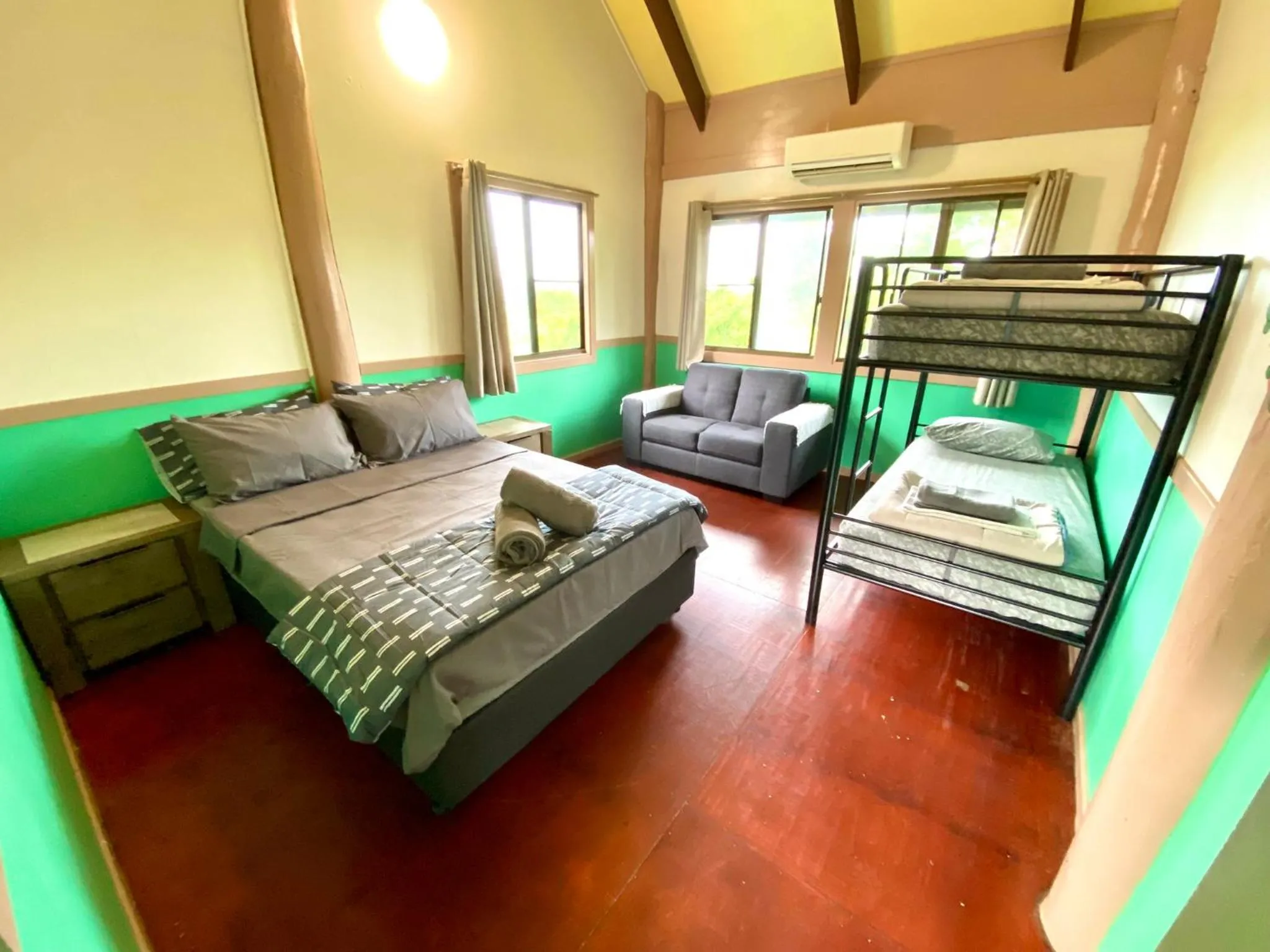 Bed in Jackaroo Treehouse Rainforest Retreat