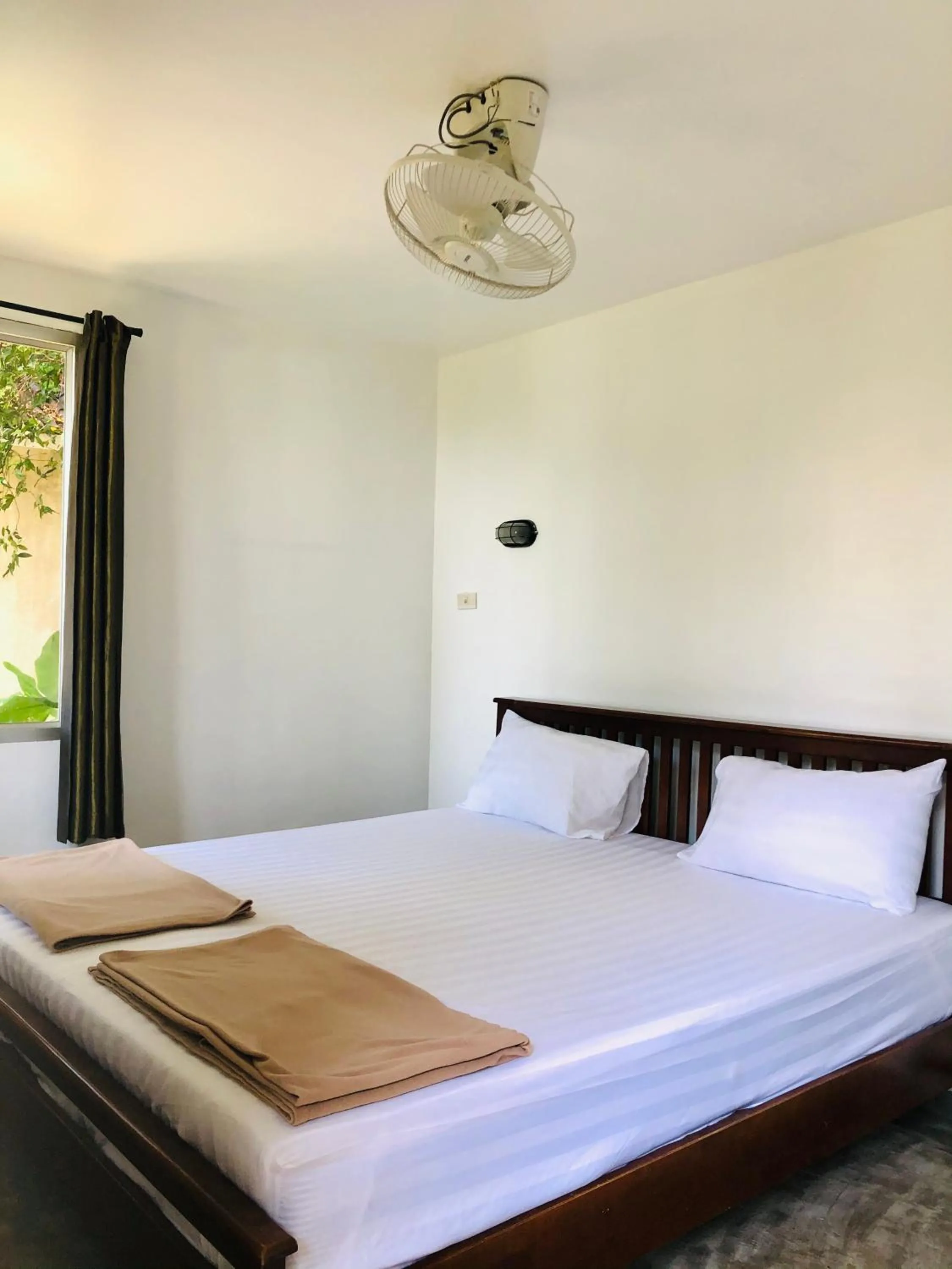 Bed in Paradise Cottage