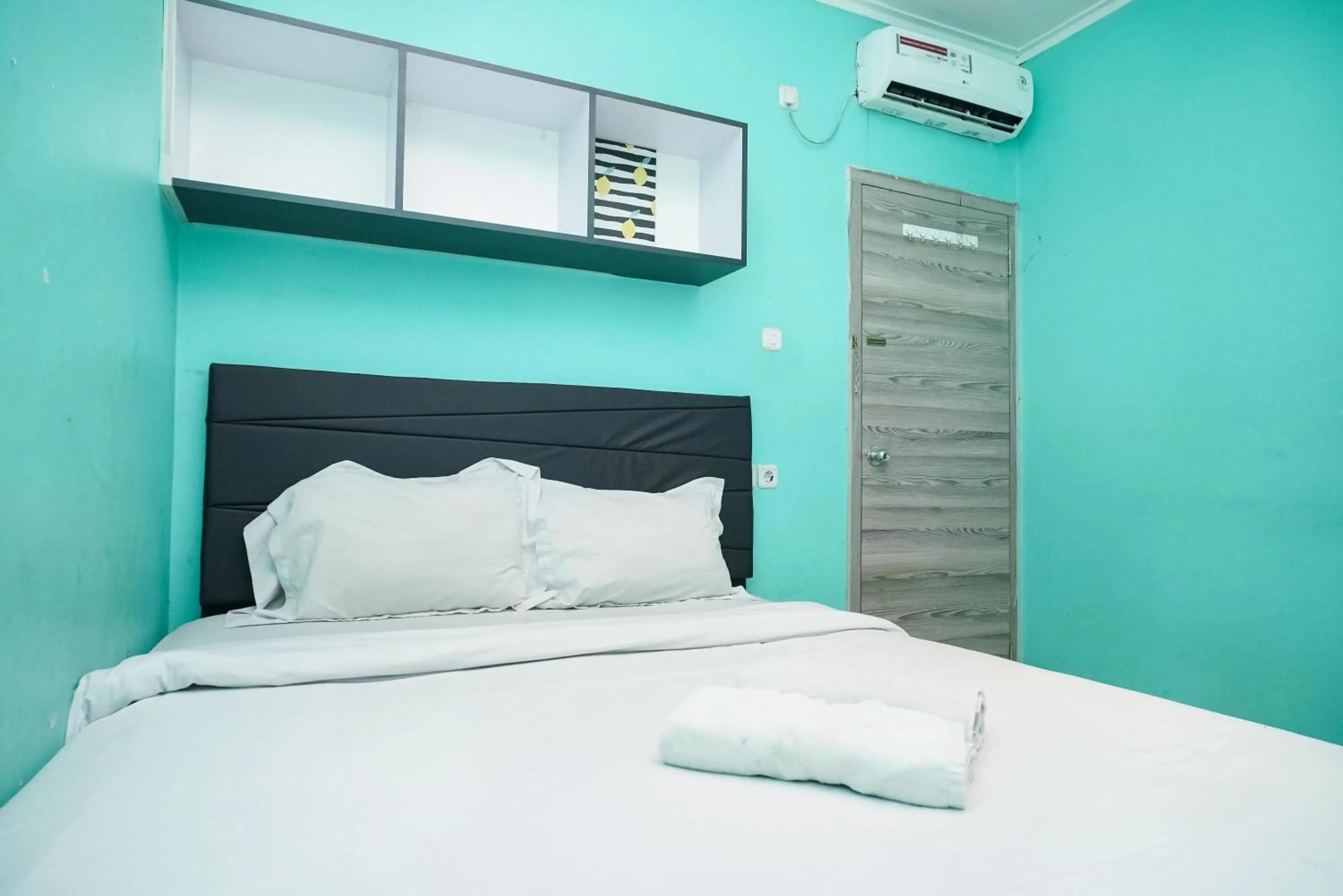 Bedroom, Bed in KoolKost near Universitas BINUS Anggrek