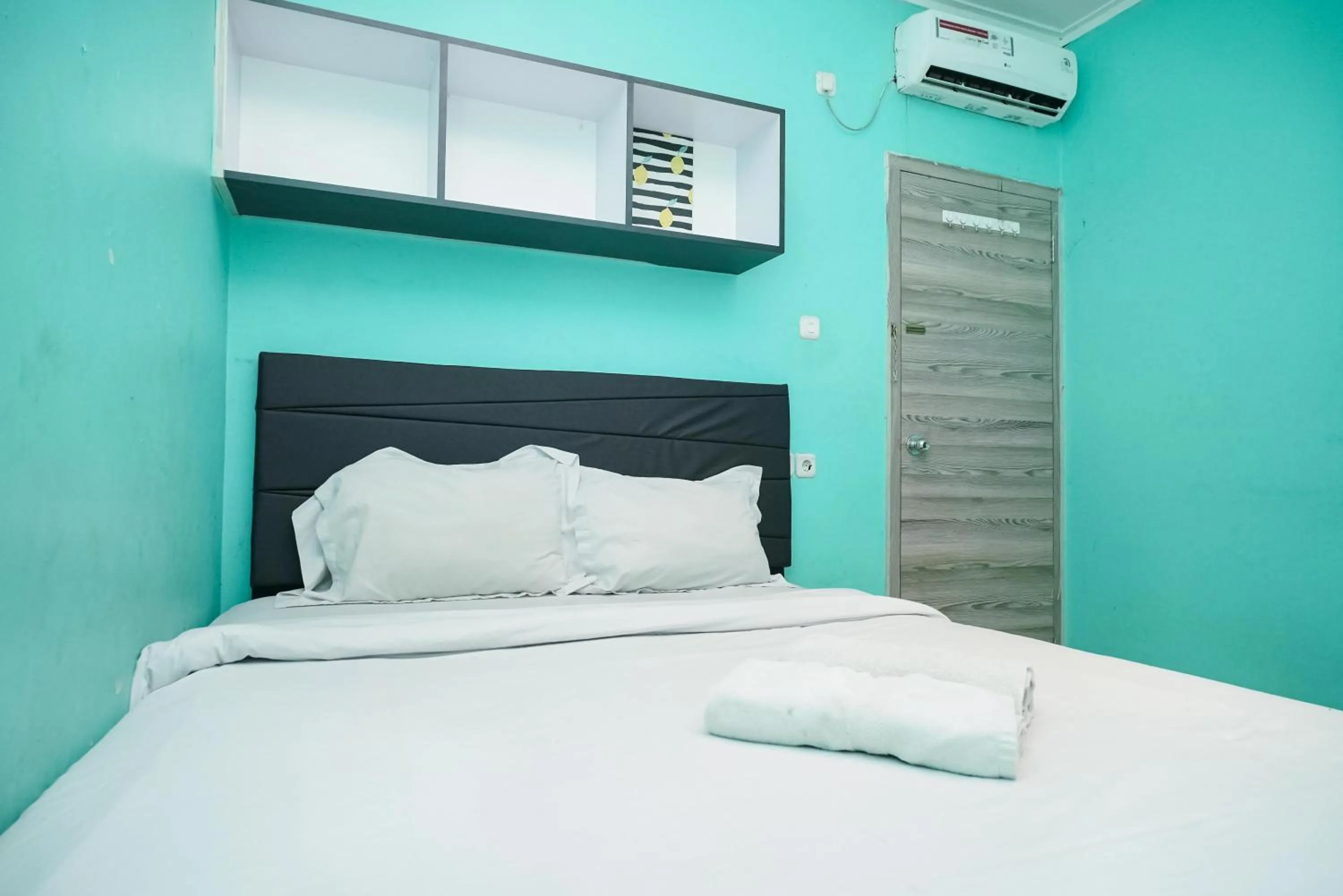 Bedroom, Bed in KoolKost near Universitas BINUS Anggrek