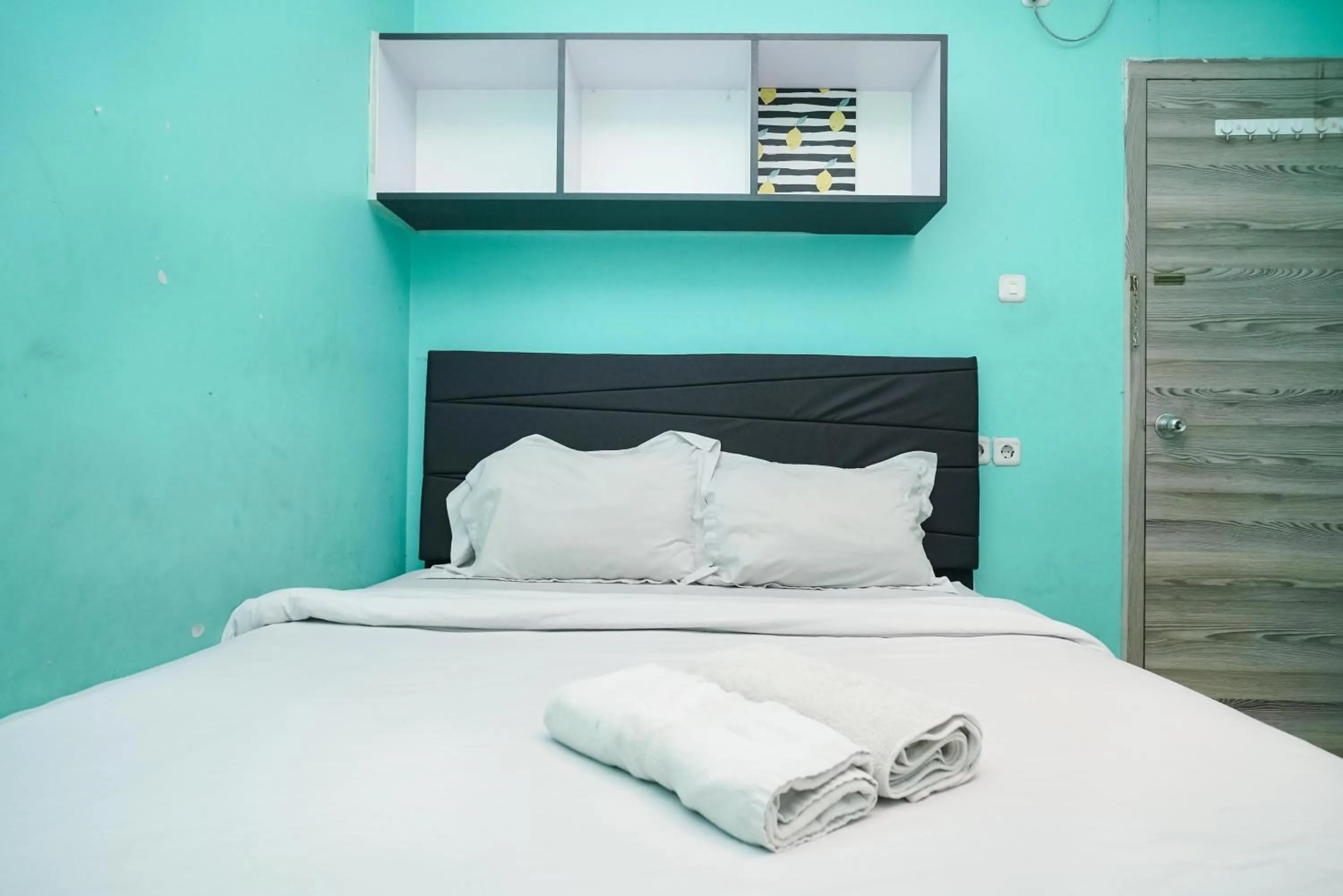 Bedroom, Bed in KoolKost near Universitas BINUS Anggrek