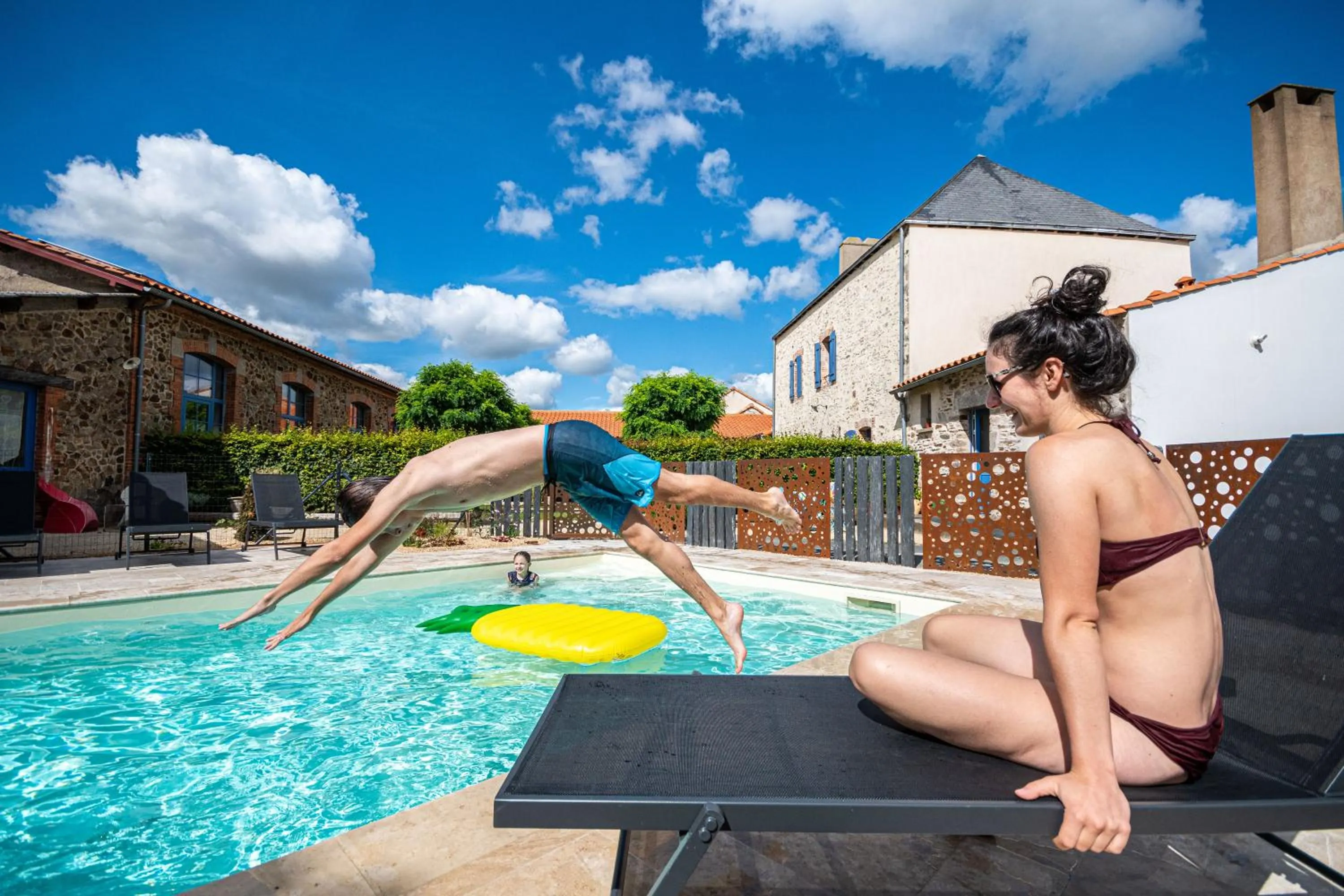 Swimming pool in Le DOMAINE DES ECOLIERS B&B