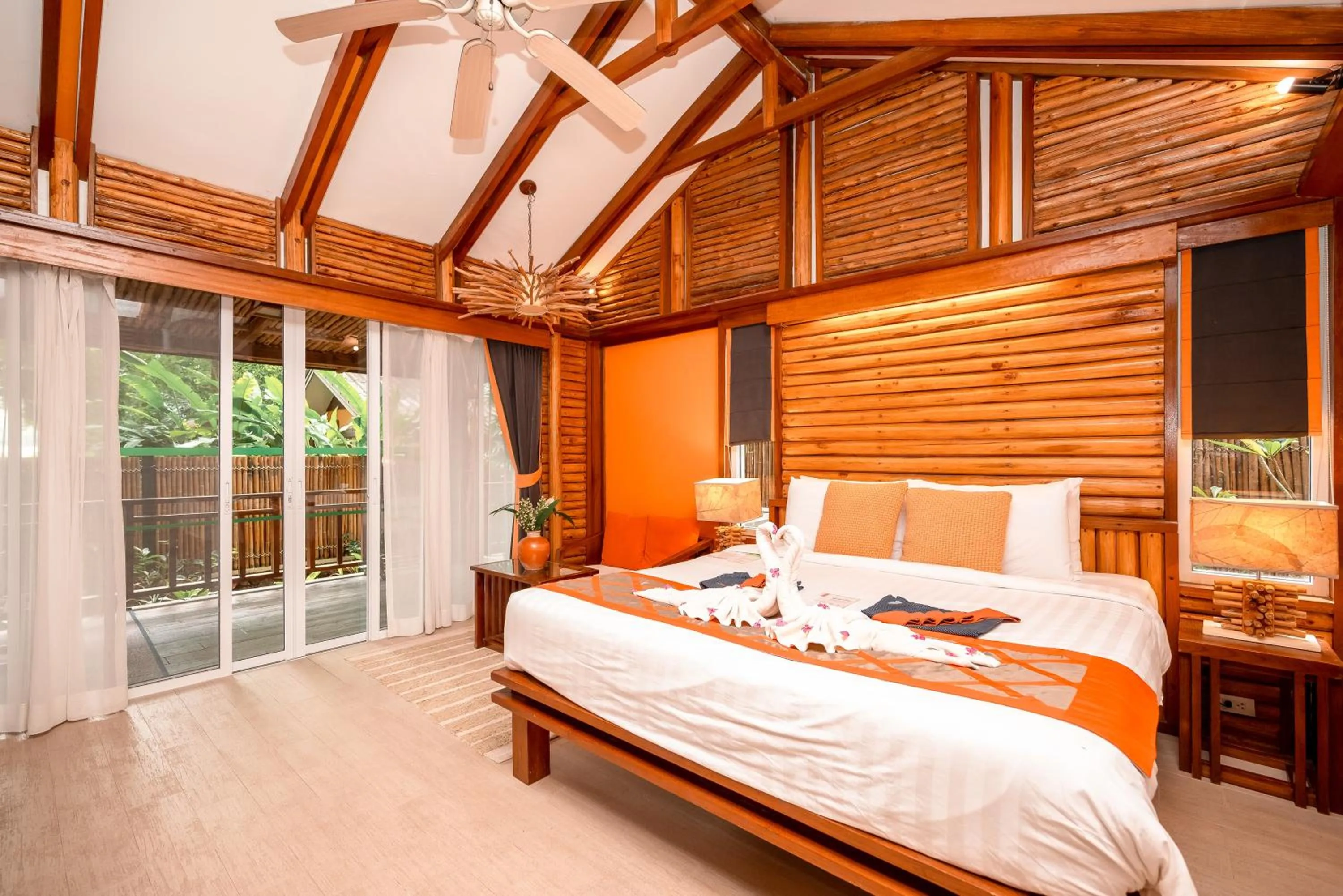 Bed in Home Phutoey River Kwai Hotspring & Nature Resort