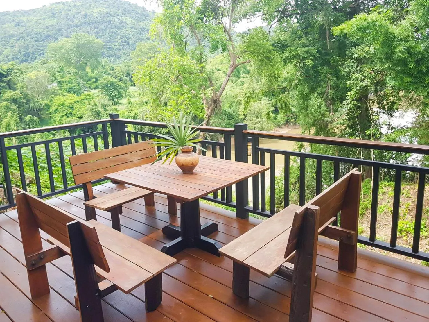 Seating area in Home Phutoey River Kwai Hotspring & Nature Resort