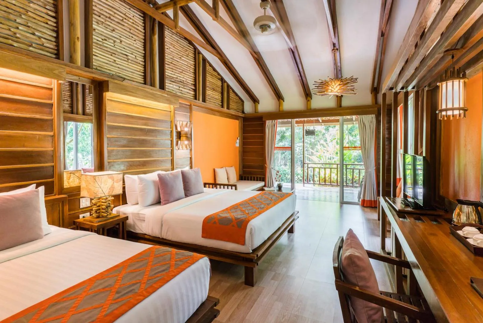 Bed in Home Phutoey River Kwai Hotspring & Nature Resort