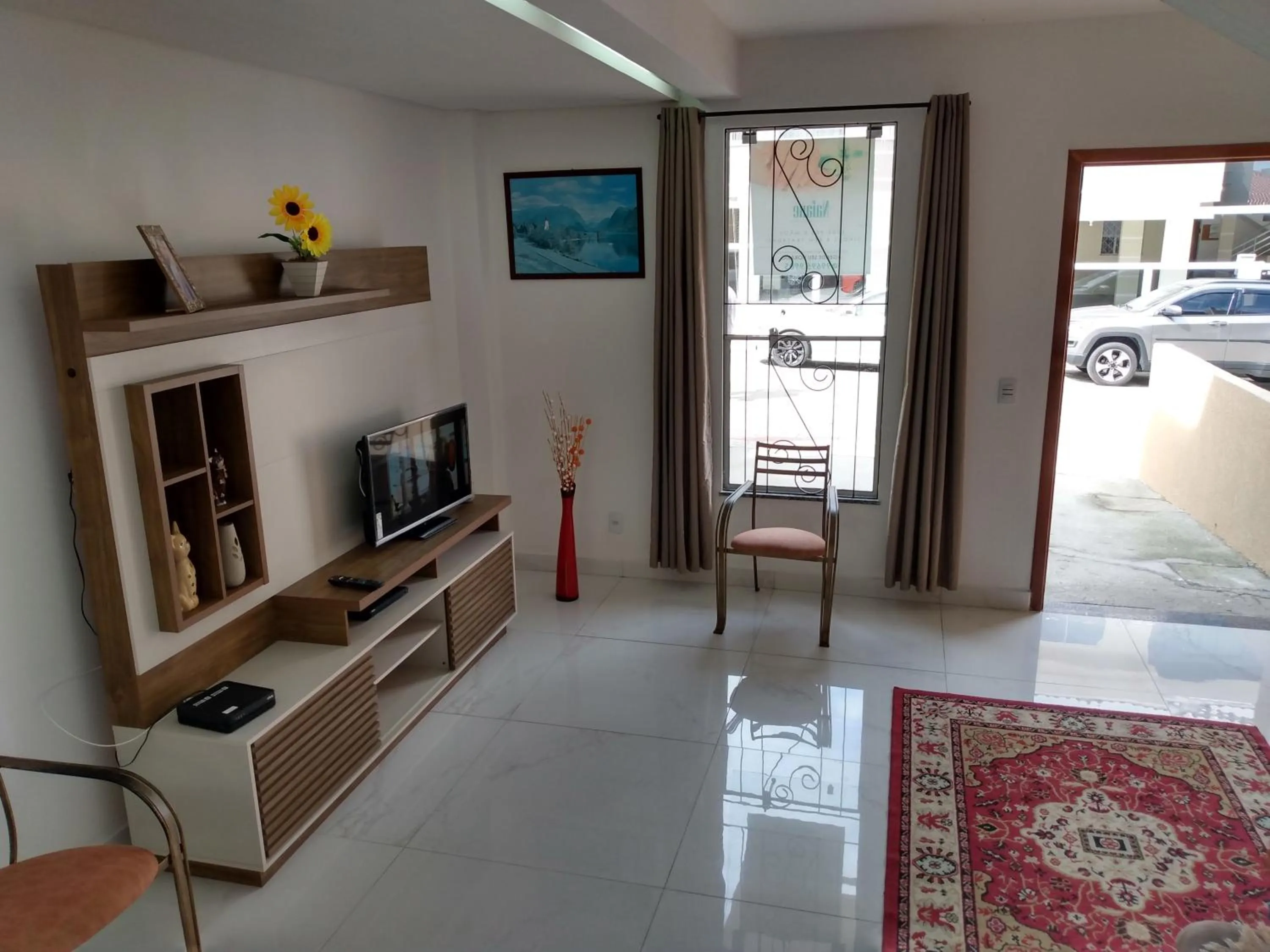 Communal lounge/ TV room in Casa na praia de ingleses