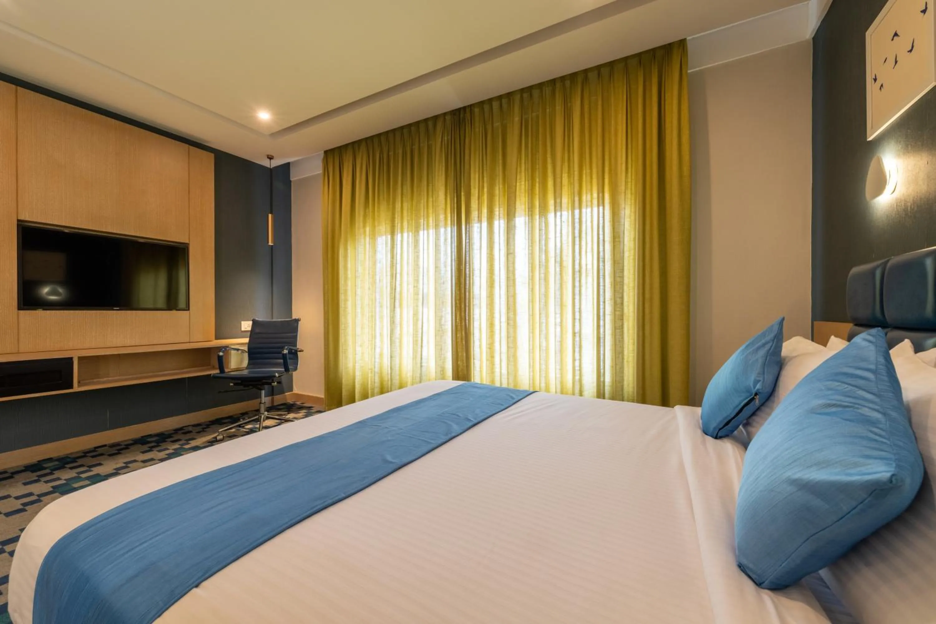 Bed in Mintotel Wayanad