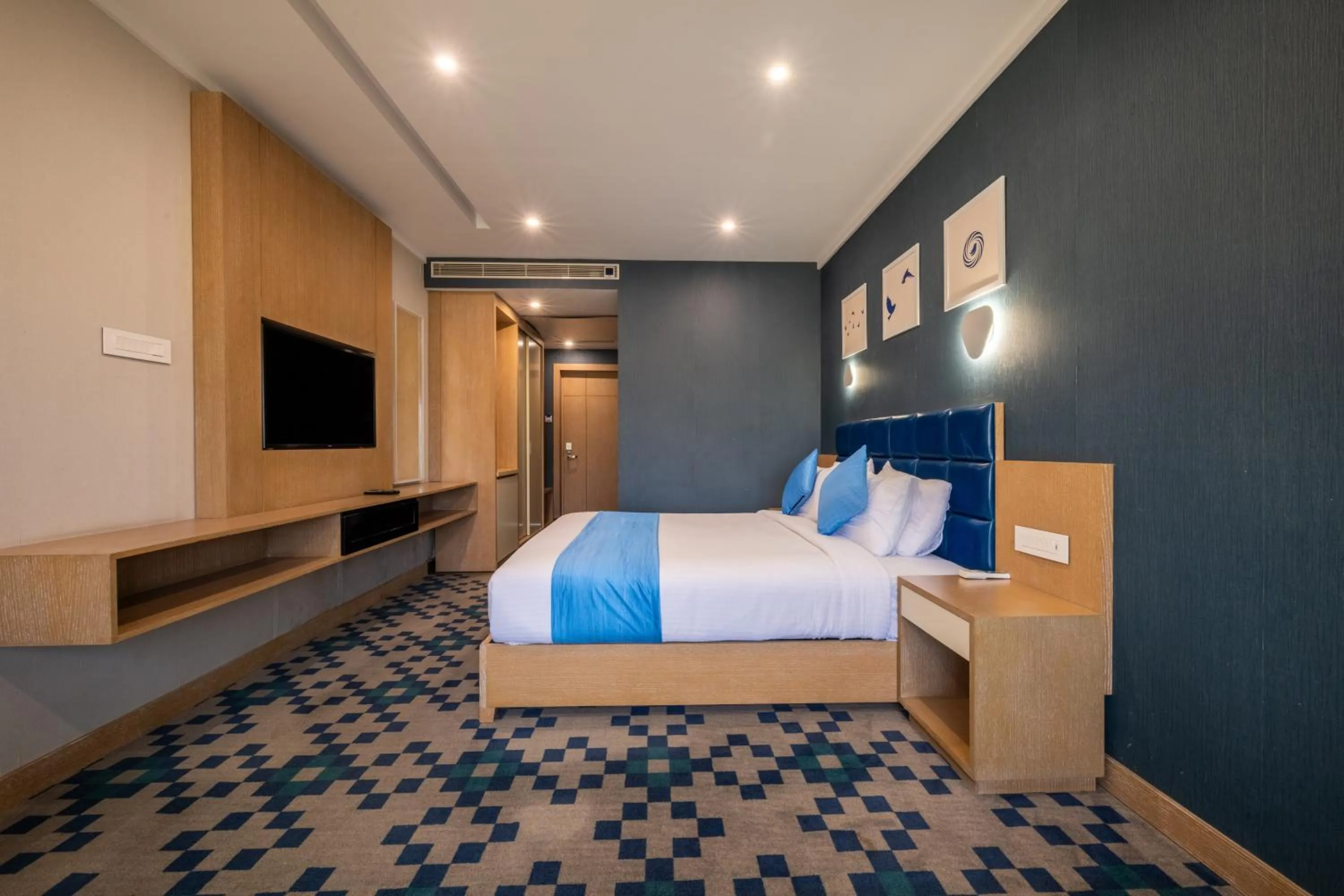 Photo of the whole room, Bed in Mintotel Wayanad