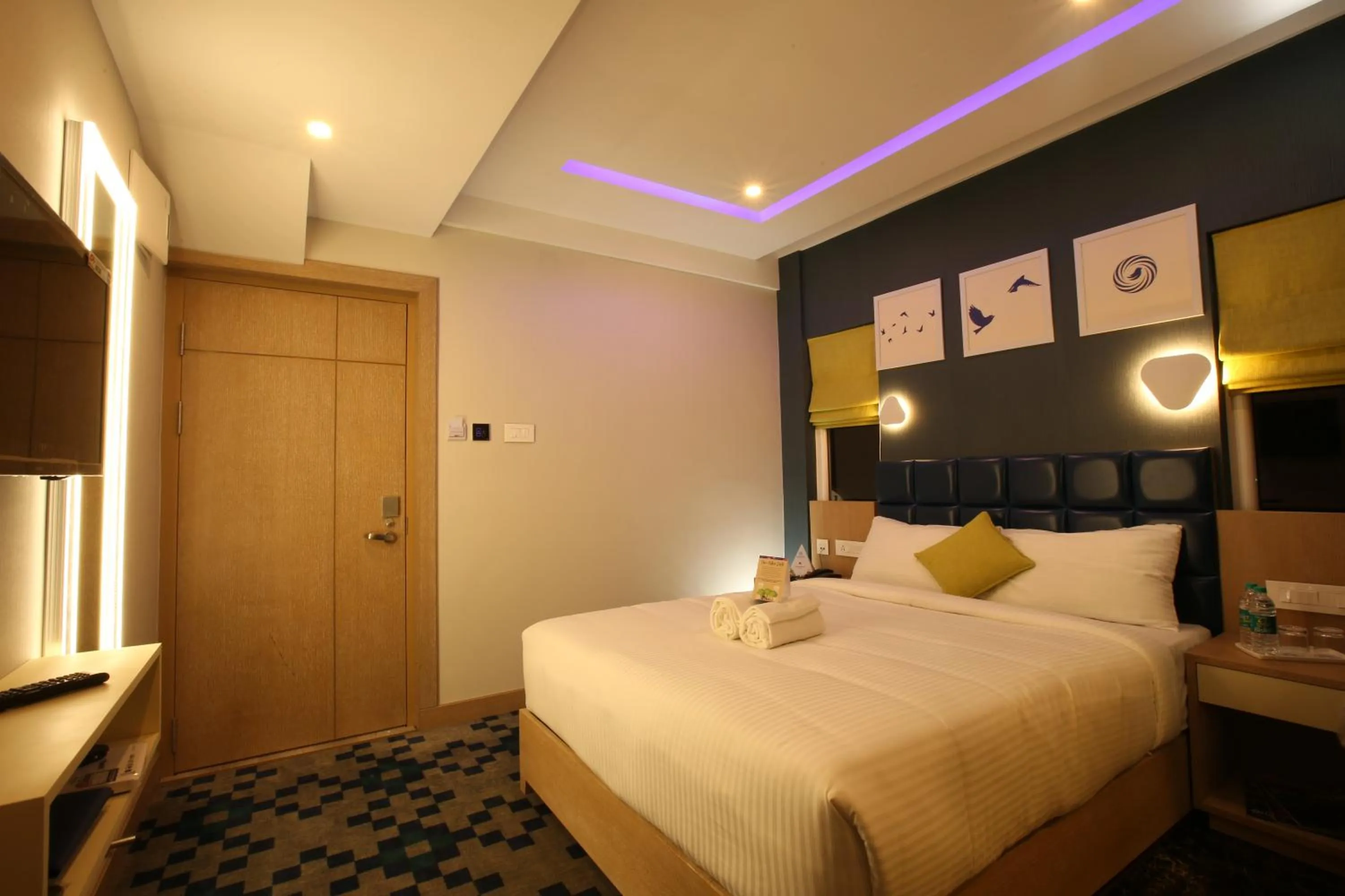 Bed in Mintotel Wayanad