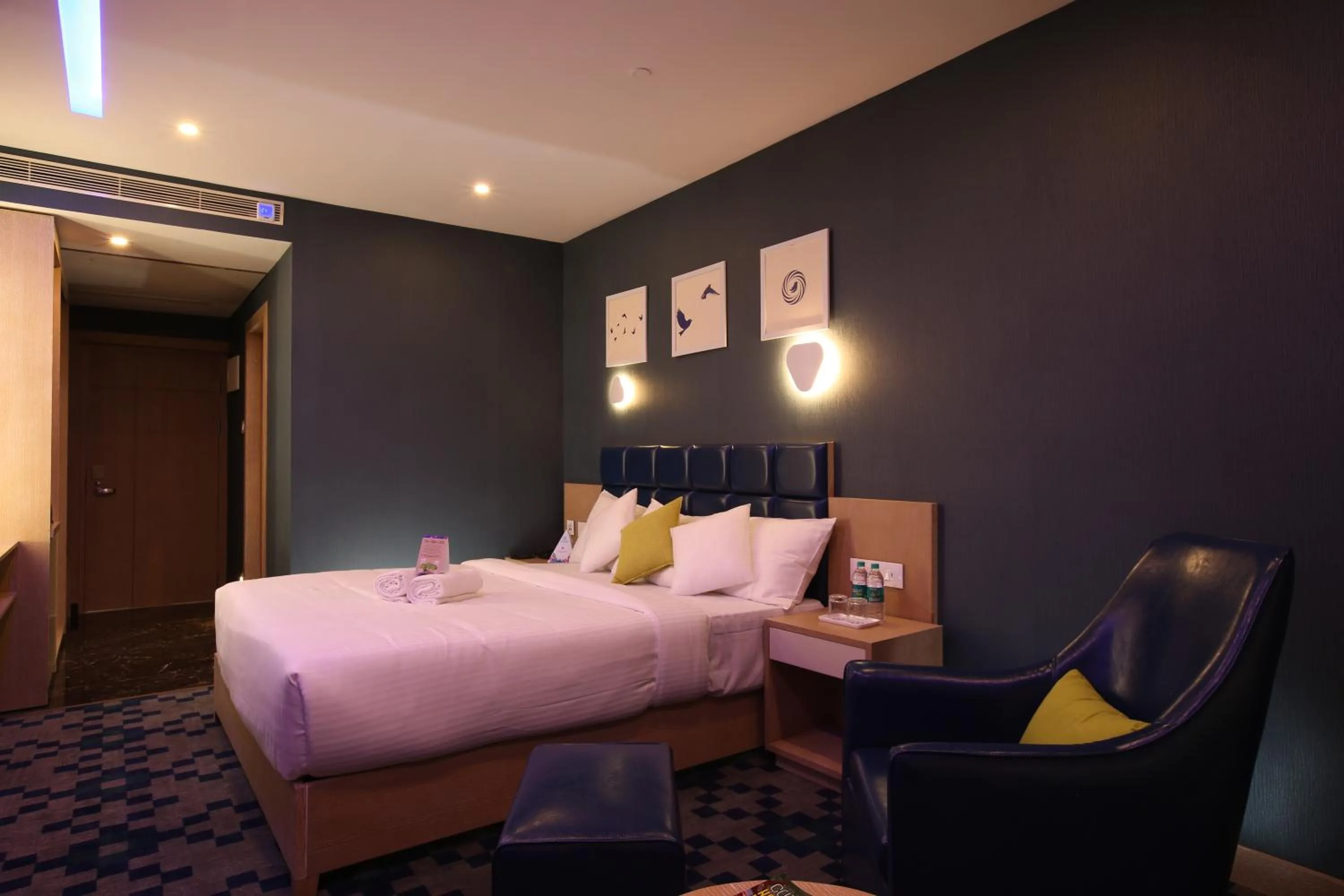 Photo of the whole room, Bed in Mintotel Wayanad