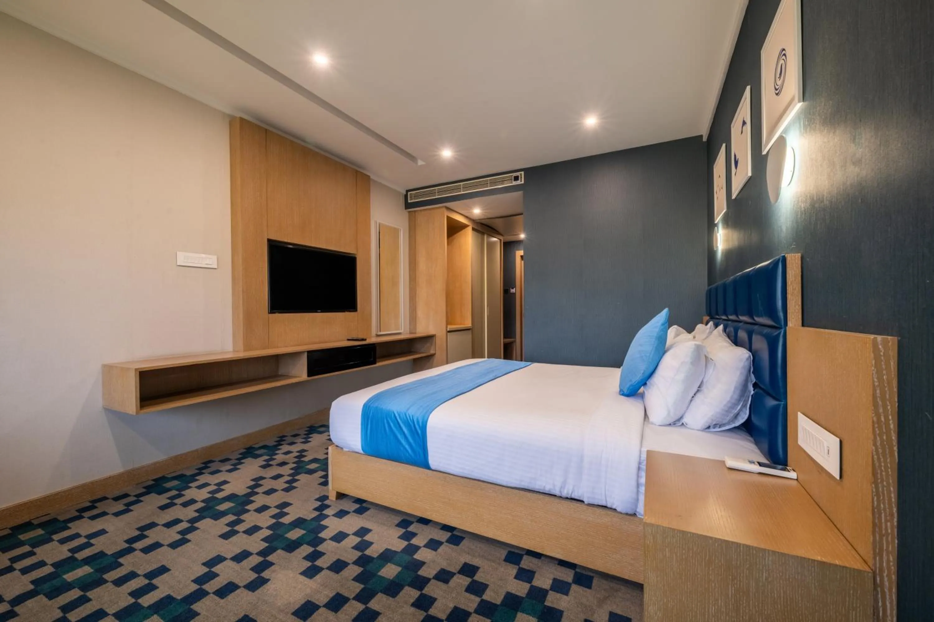 Bed in Mintotel Wayanad