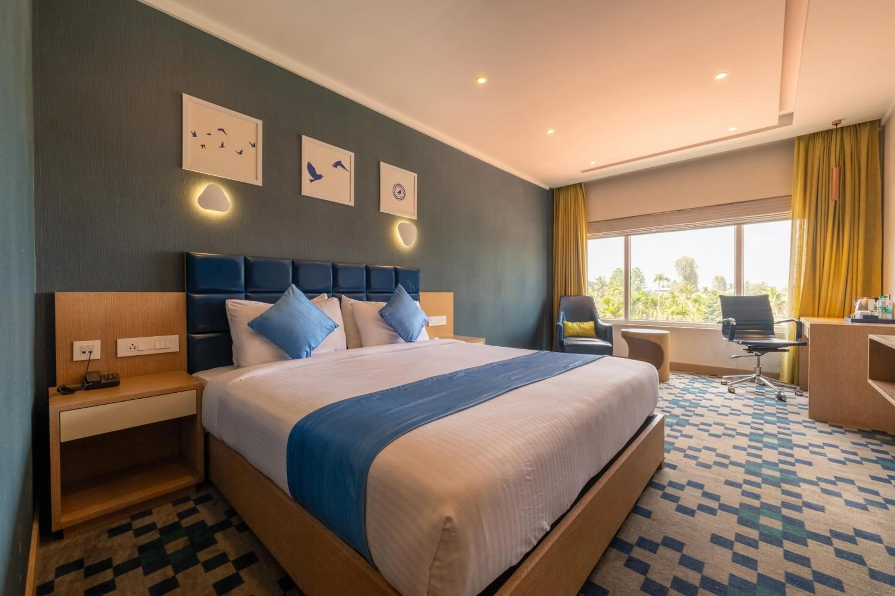 Bed in Mintotel Wayanad