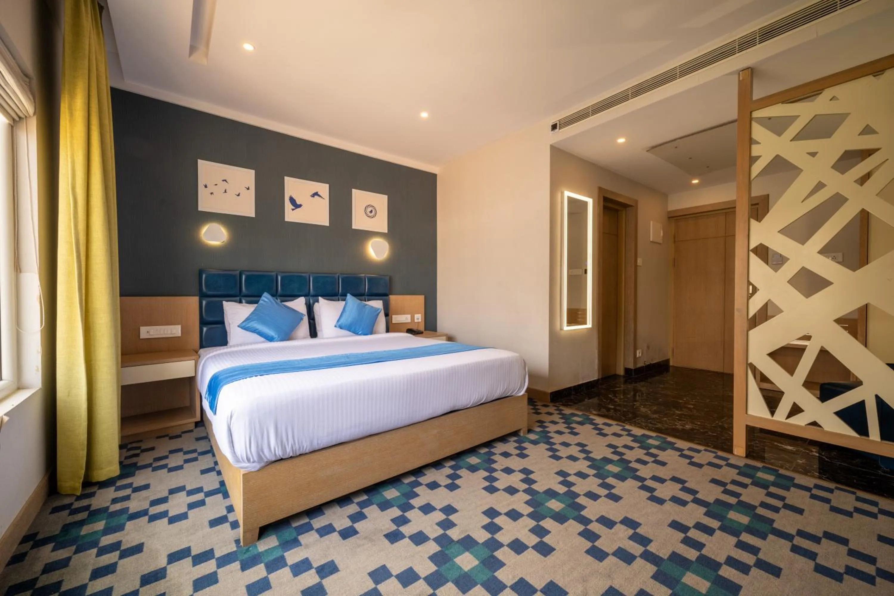 Photo of the whole room, Bed in Mintotel Wayanad