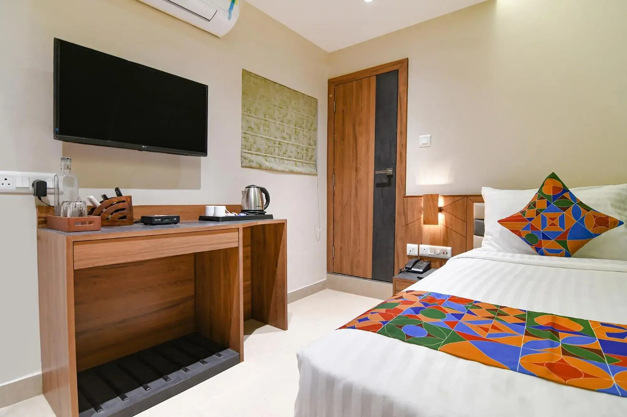 Bed in FabHotel Prime Swagatam International Chinar Park Bed in FabHotel Prime Swagatam International Chinar Park