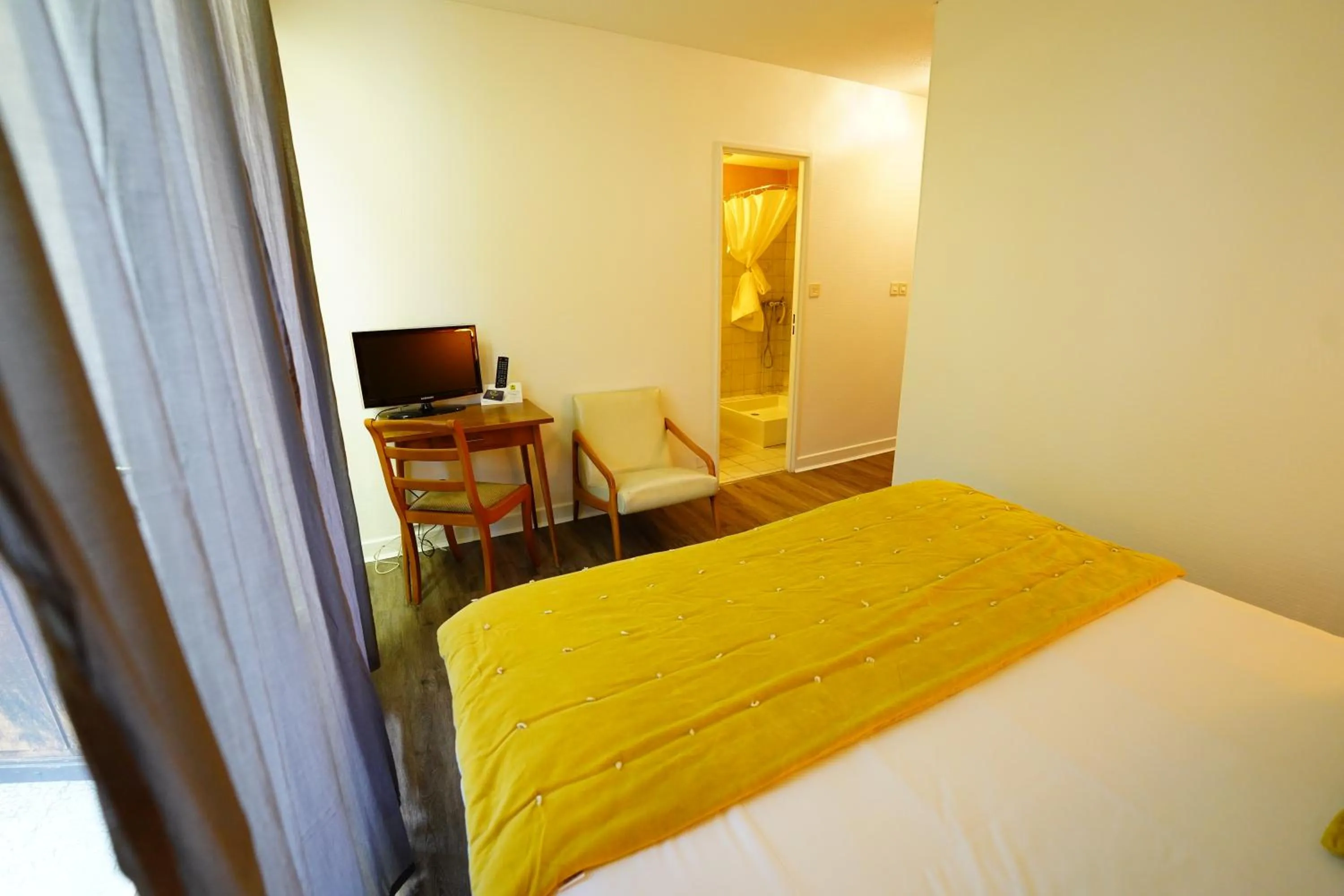 Bedroom, Bed in Logis Hôtel Le Griou