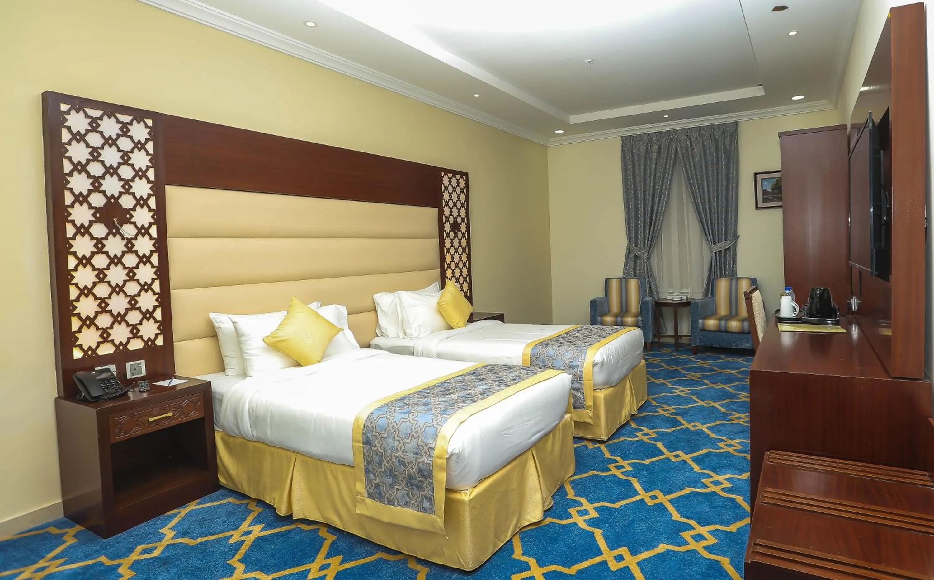 Bed in Jeddah Oasis Hotel