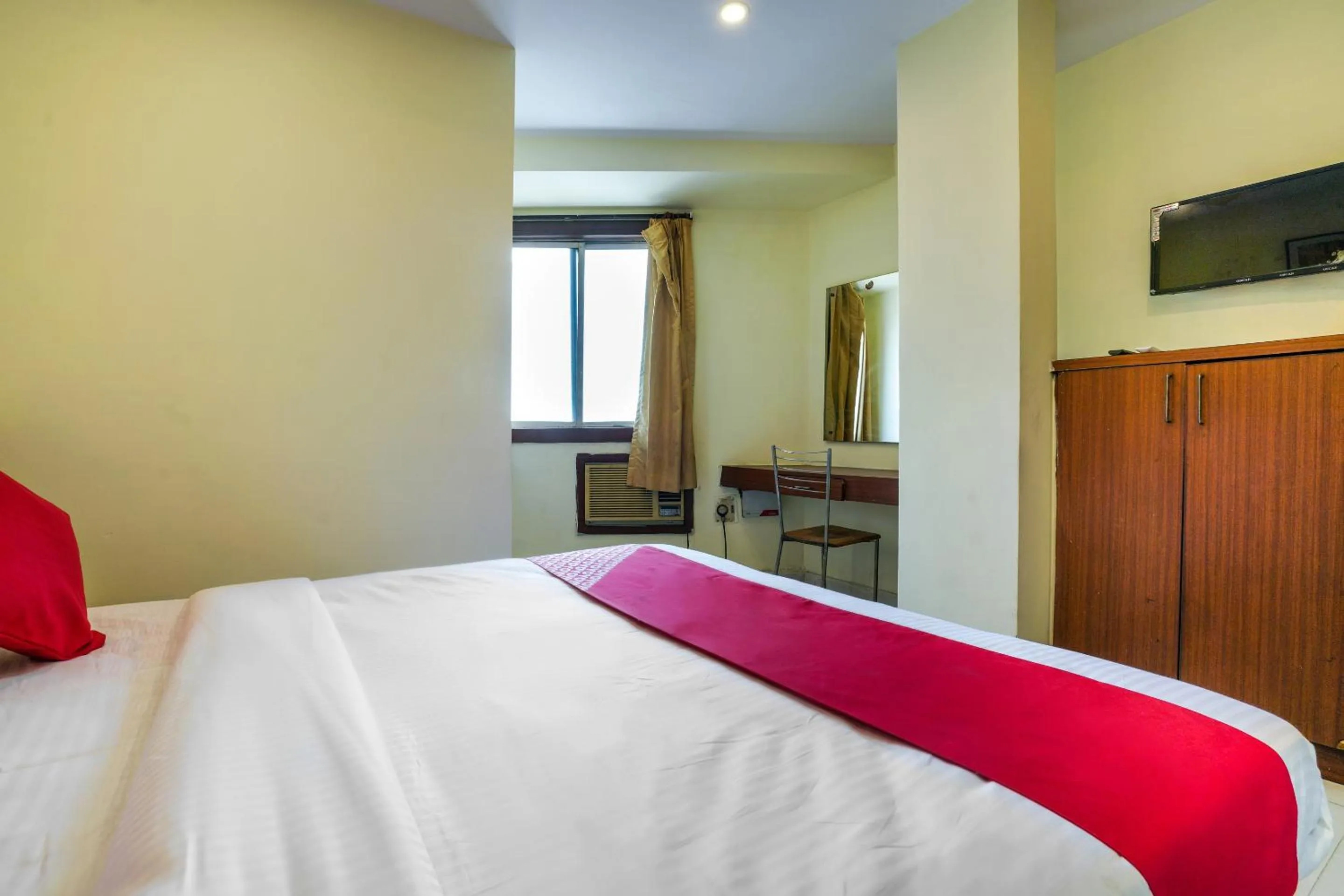 Bedroom in Hotel O Pariwar Inn