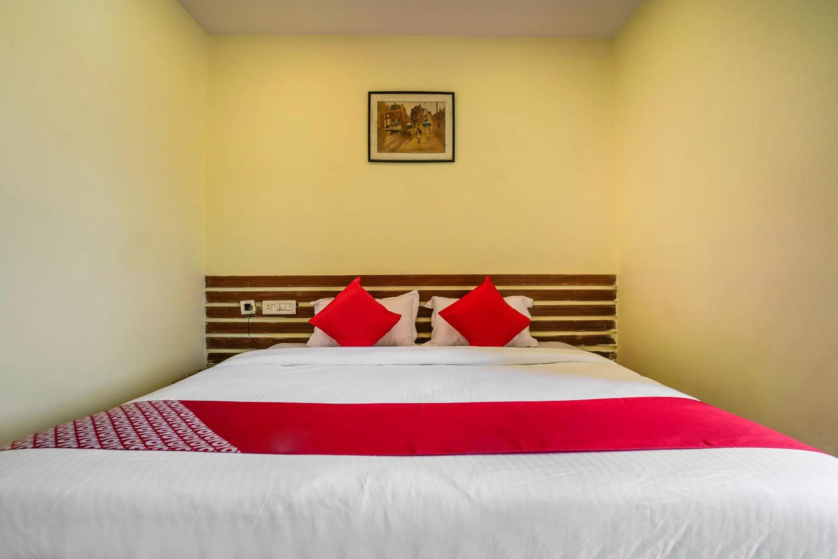 Bedroom in Hotel O Pariwar Inn