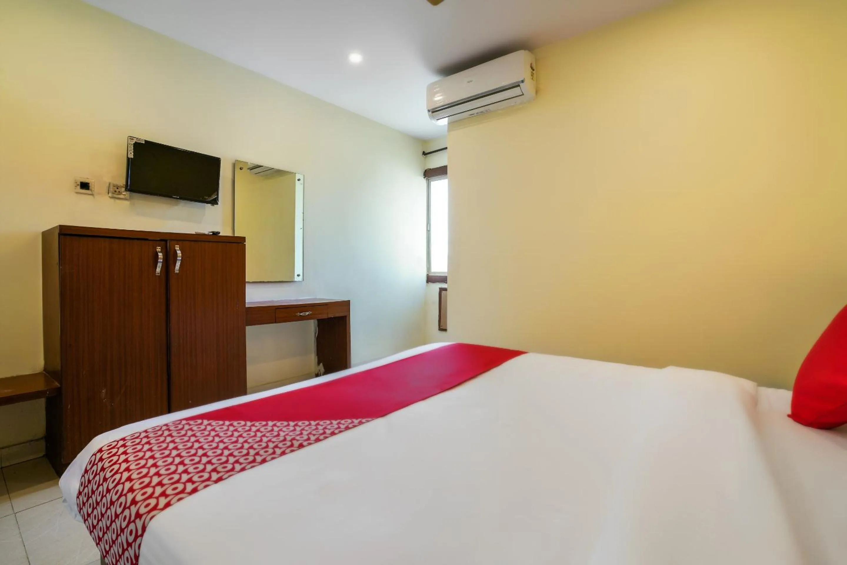 Bedroom in Hotel O Pariwar Inn