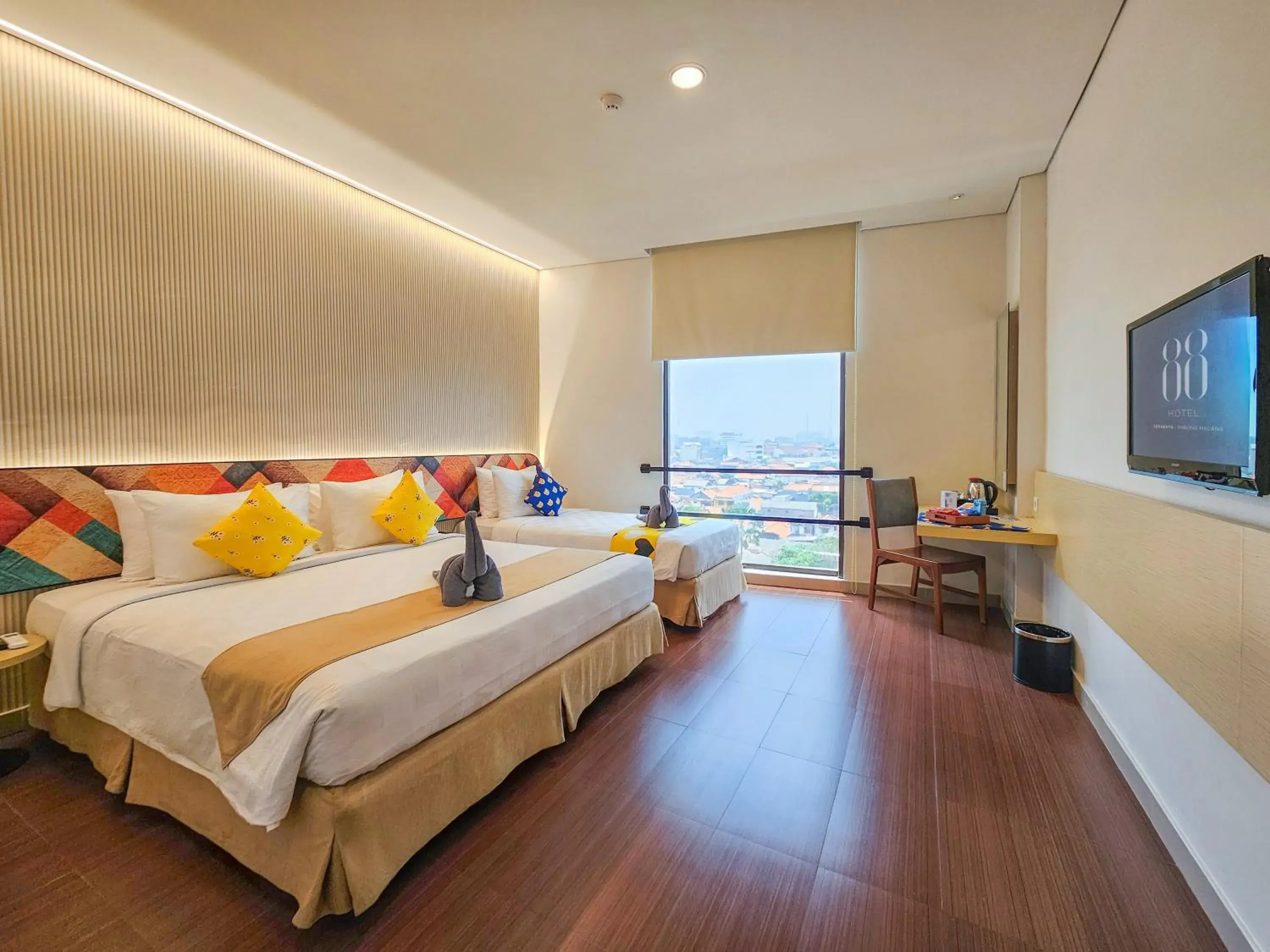 Bedroom, Bed in Hotel 88 Embong Malang Tunjungan Surabaya by WH - Breakfast with The Best View on The Highest Floor and Strategic Location in The City Center Bedroom, Bed in Hotel 88 Embong Malang Tunjungan Surabaya by WH - Breakfast with The Best View on The Highest Floor and Strategic Location in The City Center