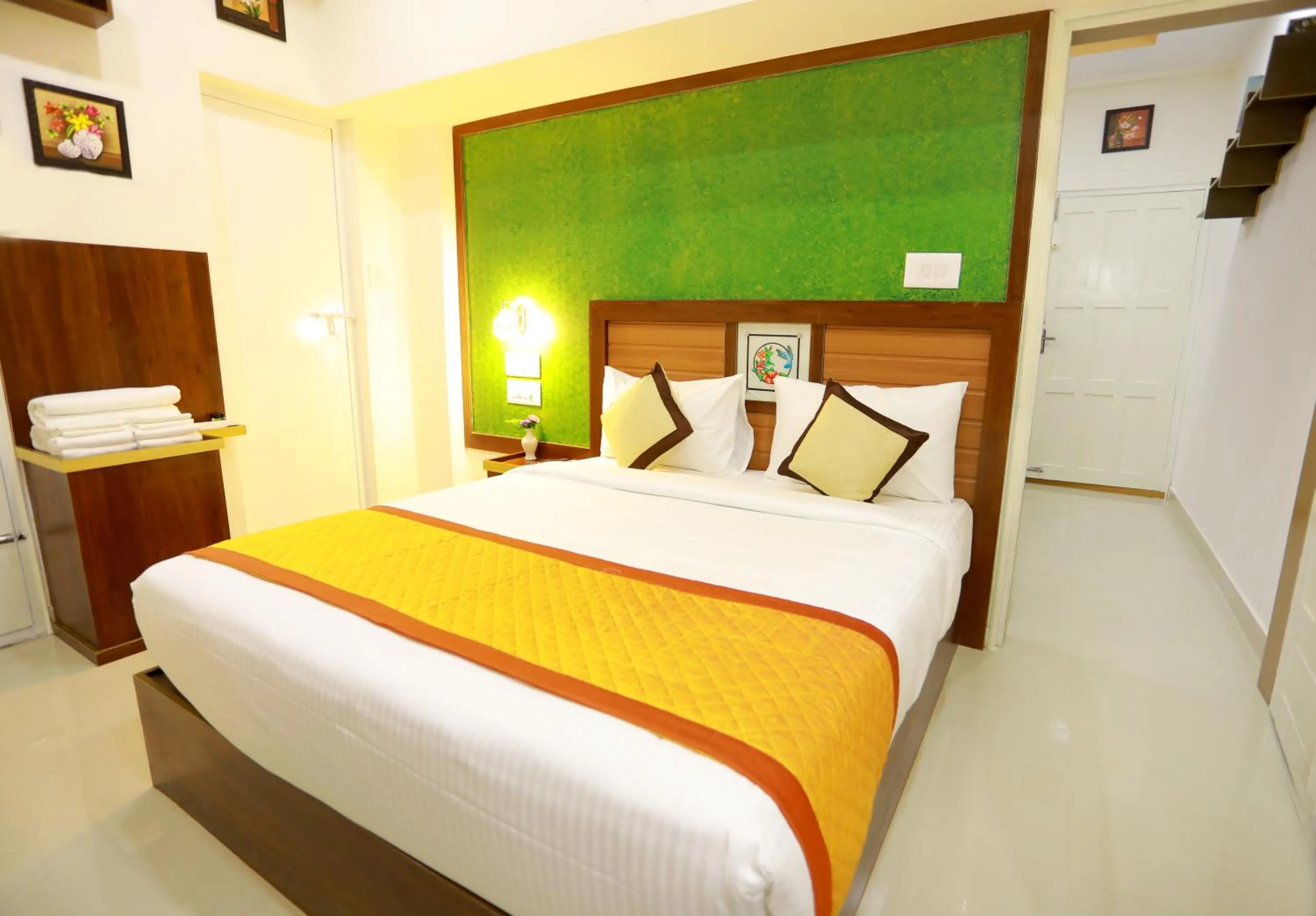 Bed in Base9 Cochin Airport Hotel