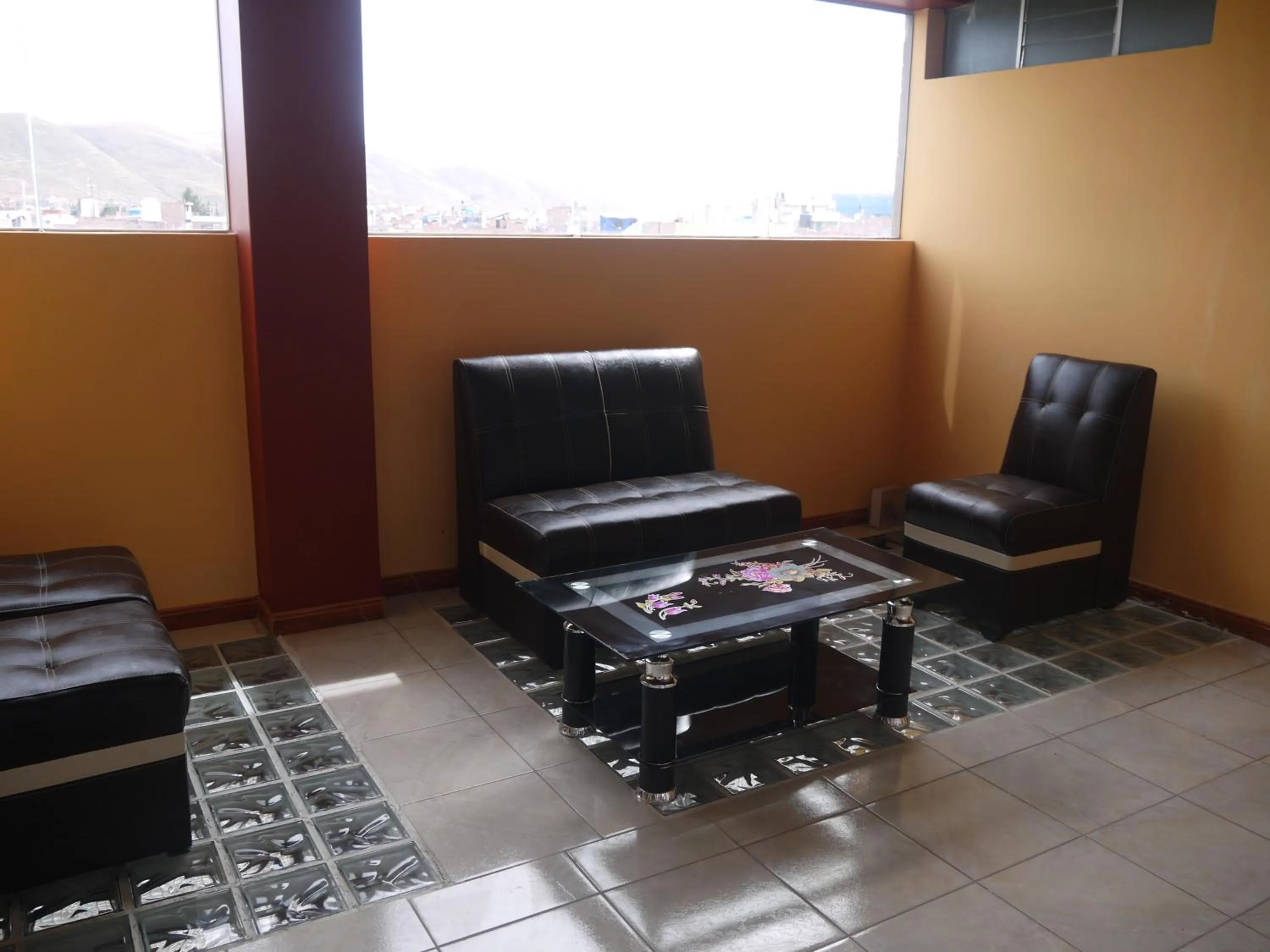 Living room in Hotel Suite Juliaca