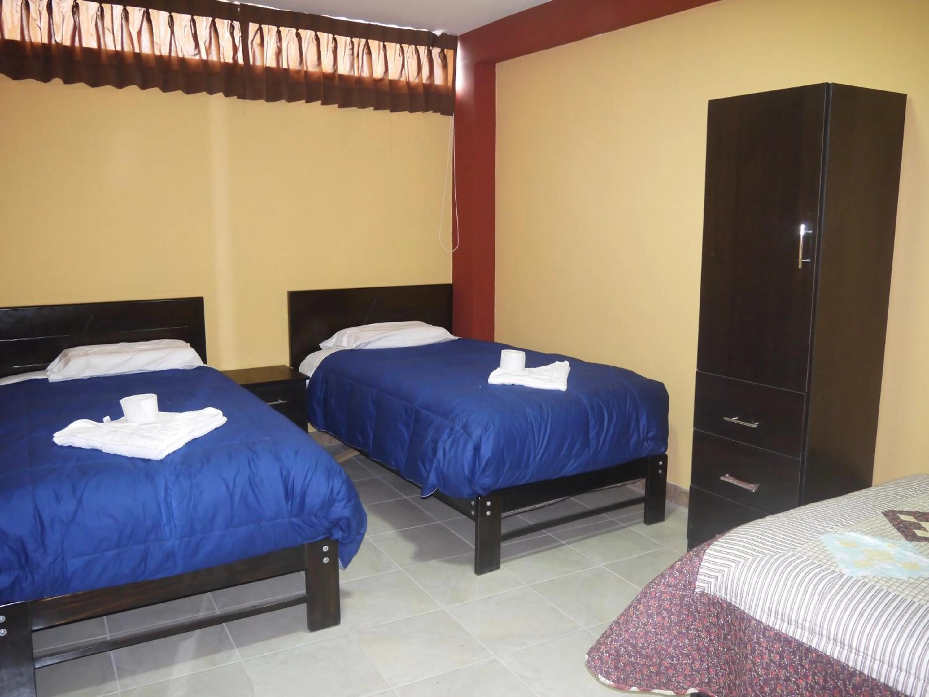 Bed in Hotel Suite Juliaca