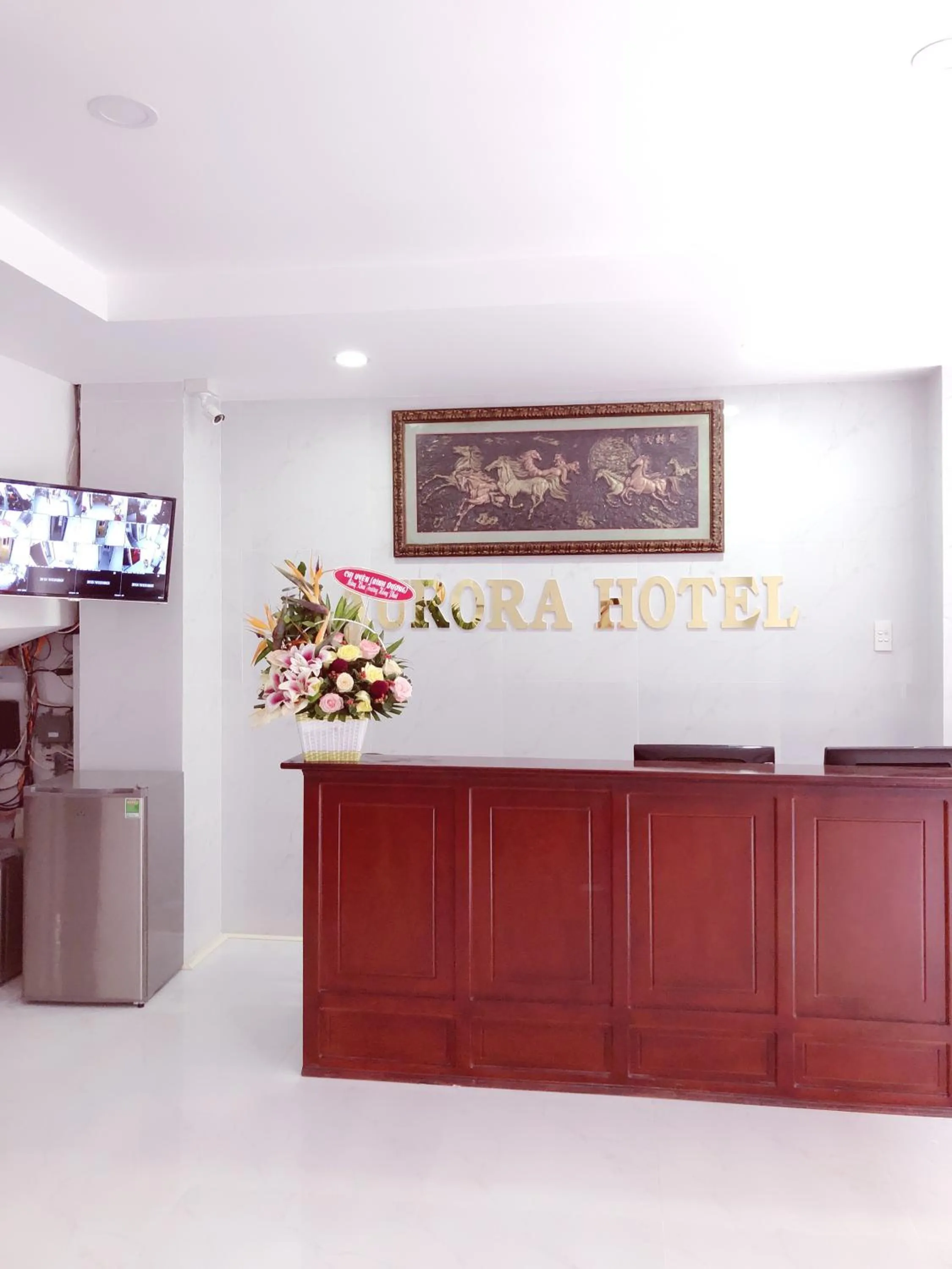 Property logo or sign in Aurora Hotel