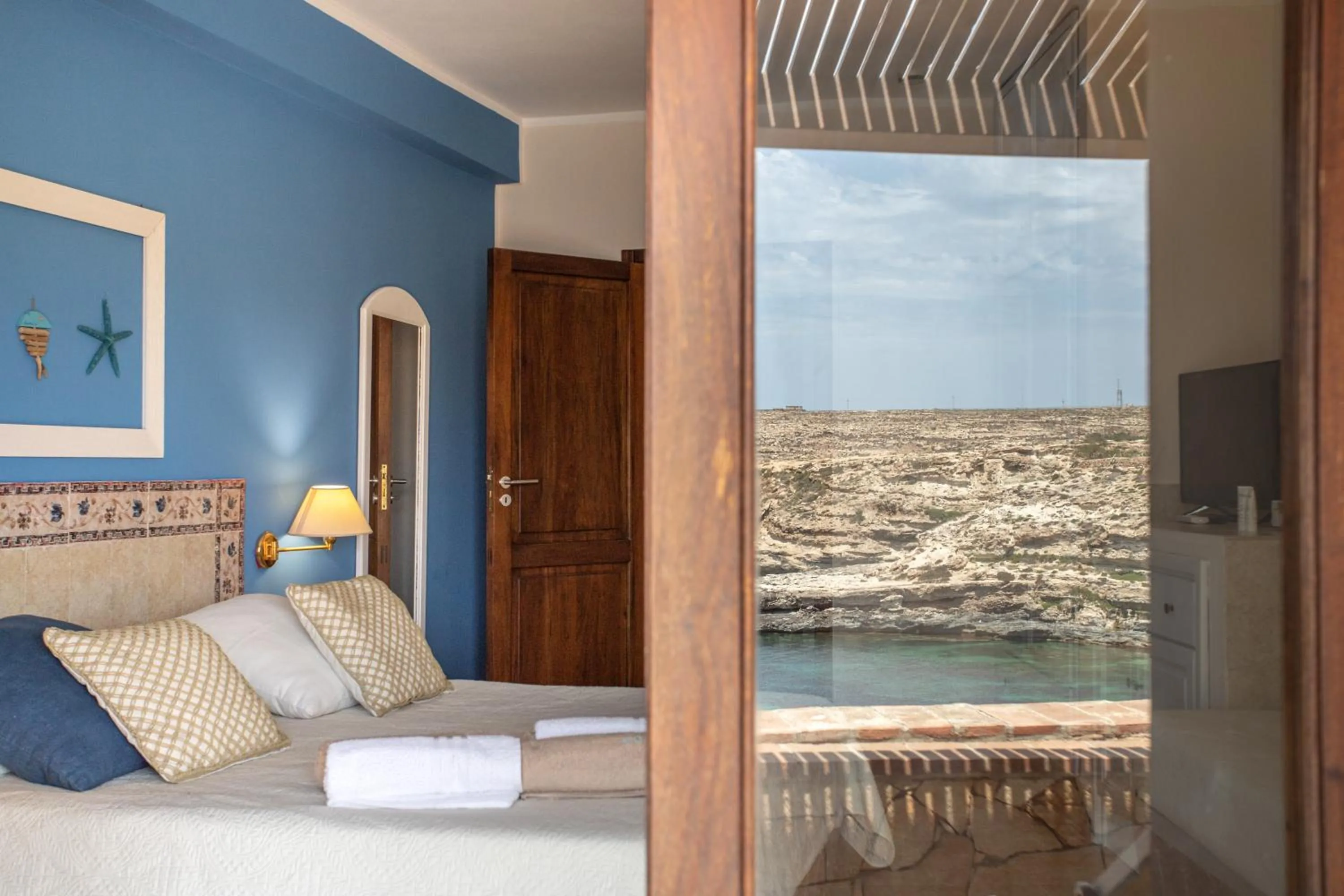 Bedroom in Relais Isole del Sud
