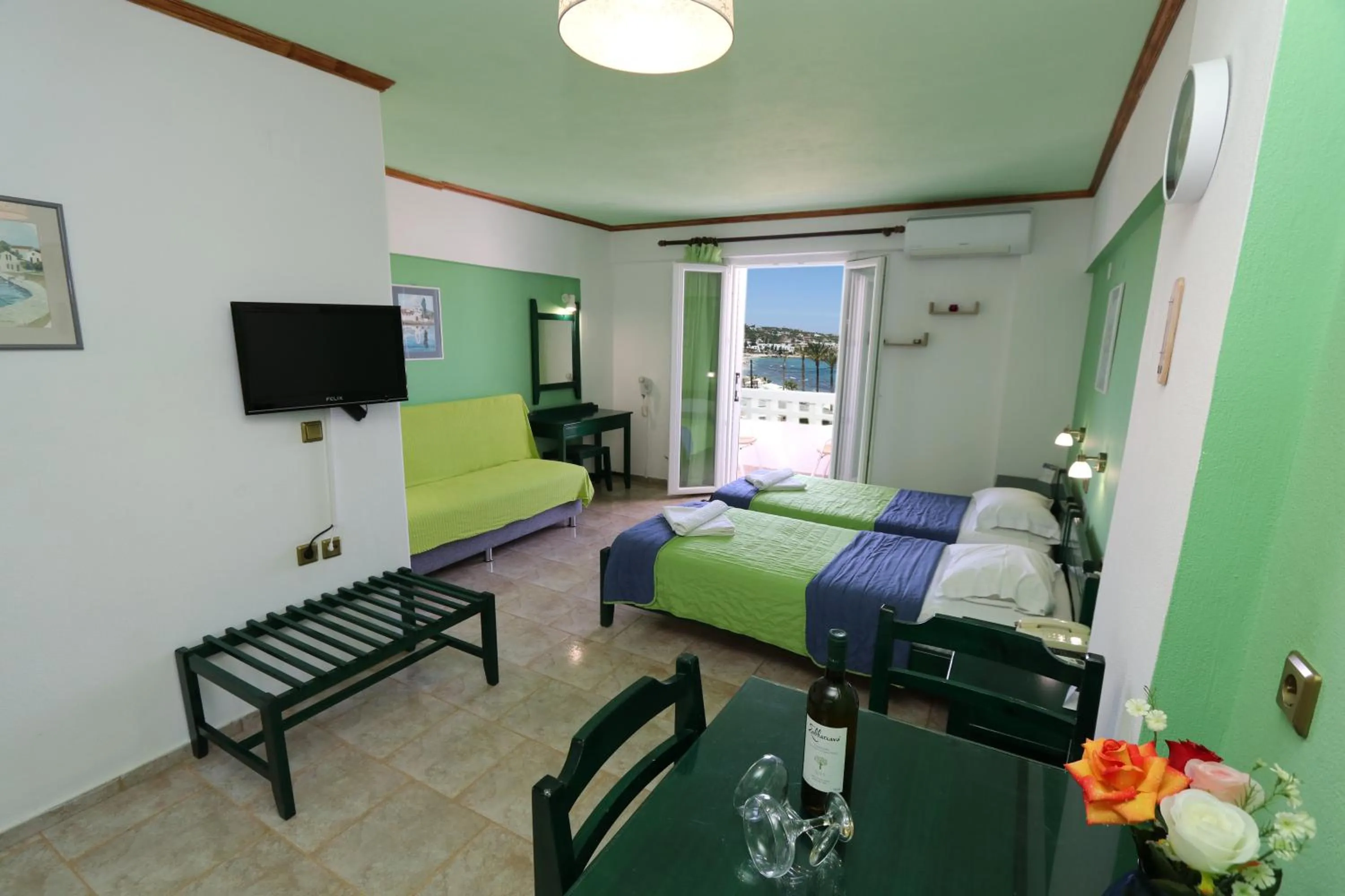 Photo of the whole room, Bed in Aris Studios