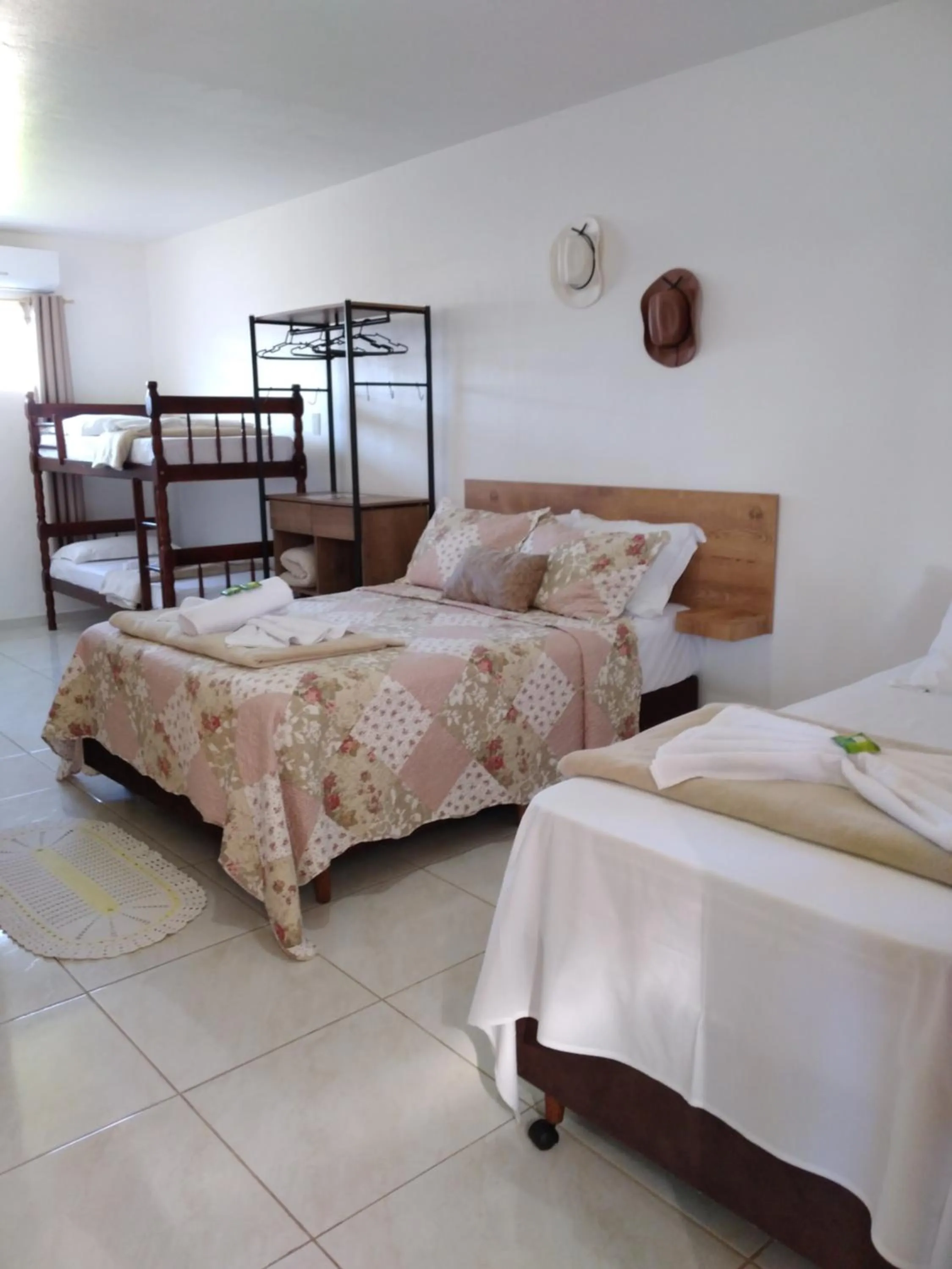 Bed in Pousada Alegria do Cowboy