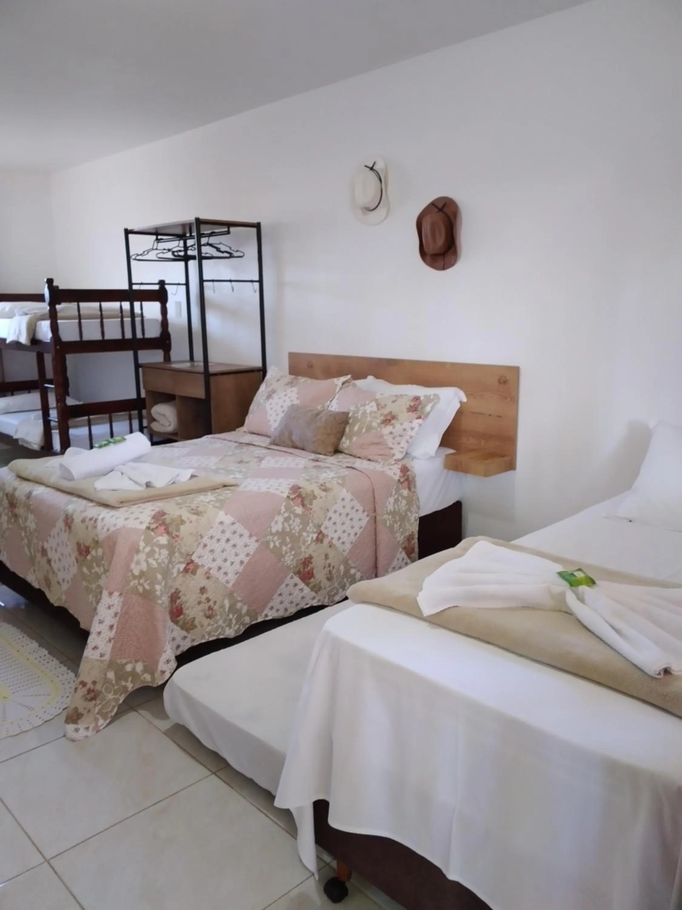 Bed in Pousada Alegria do Cowboy