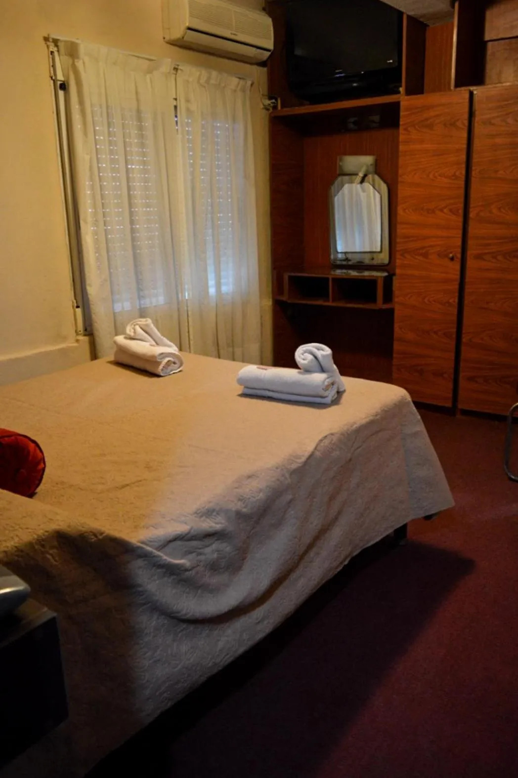 Bed in Hotel Acuarius