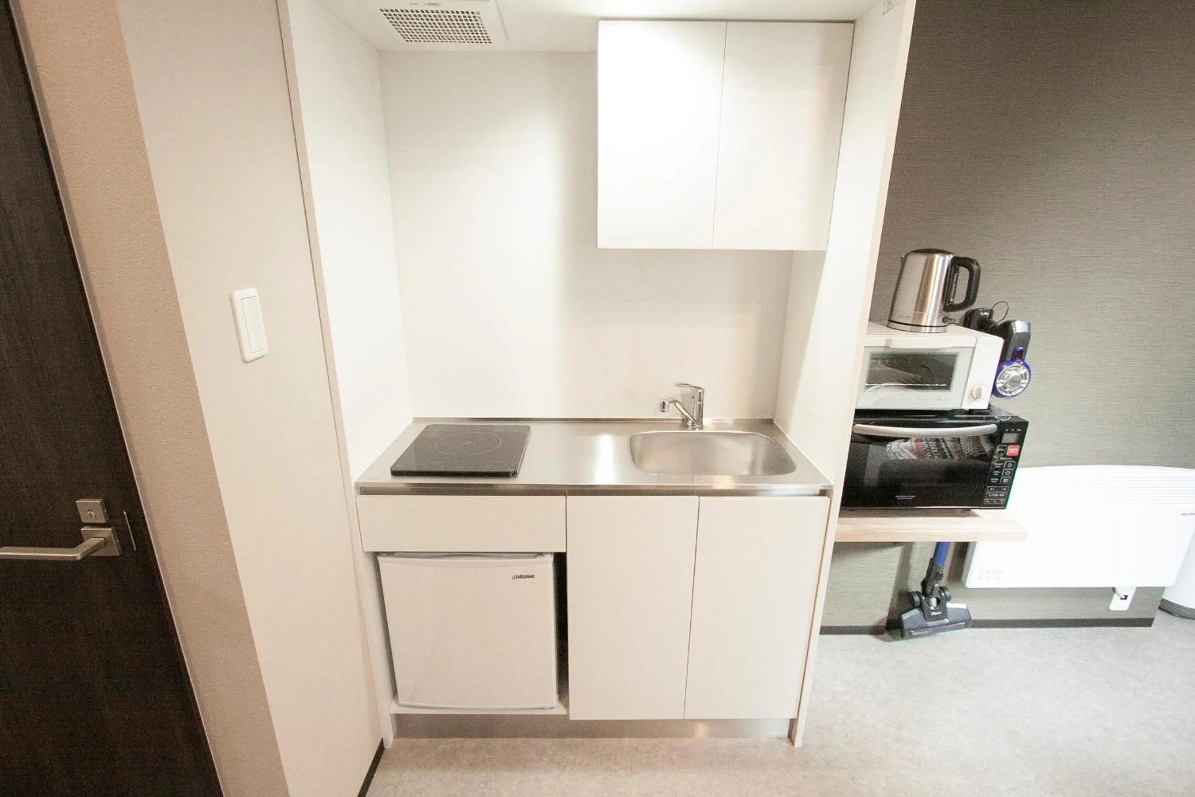 Kitchen or kitchenette in UCHI Living Stay TOYOHIRA