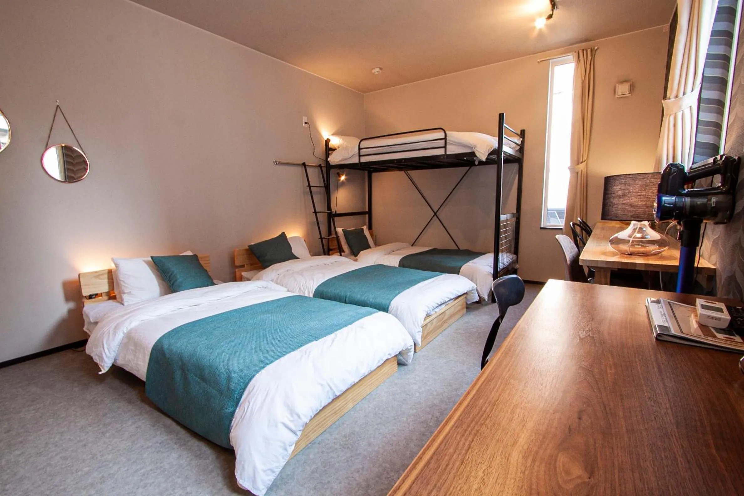 Bed in UCHI Living Stay TOYOHIRA