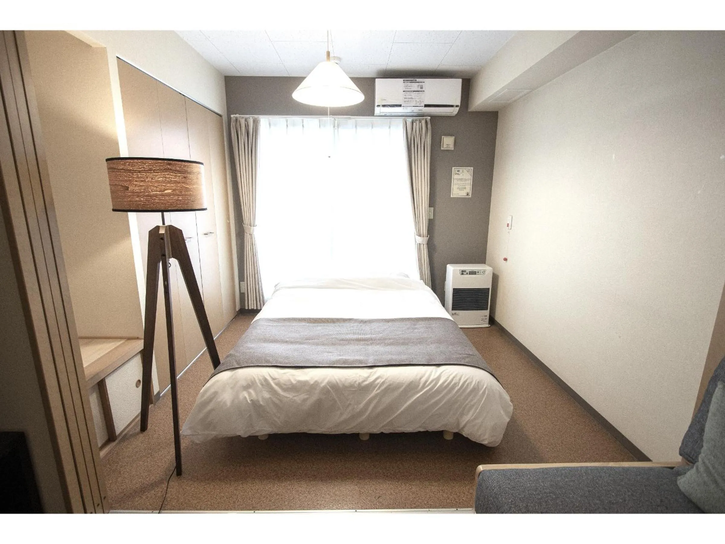 Photo of the whole room, Bed in UCHI Living Stay Otaru Suitengu