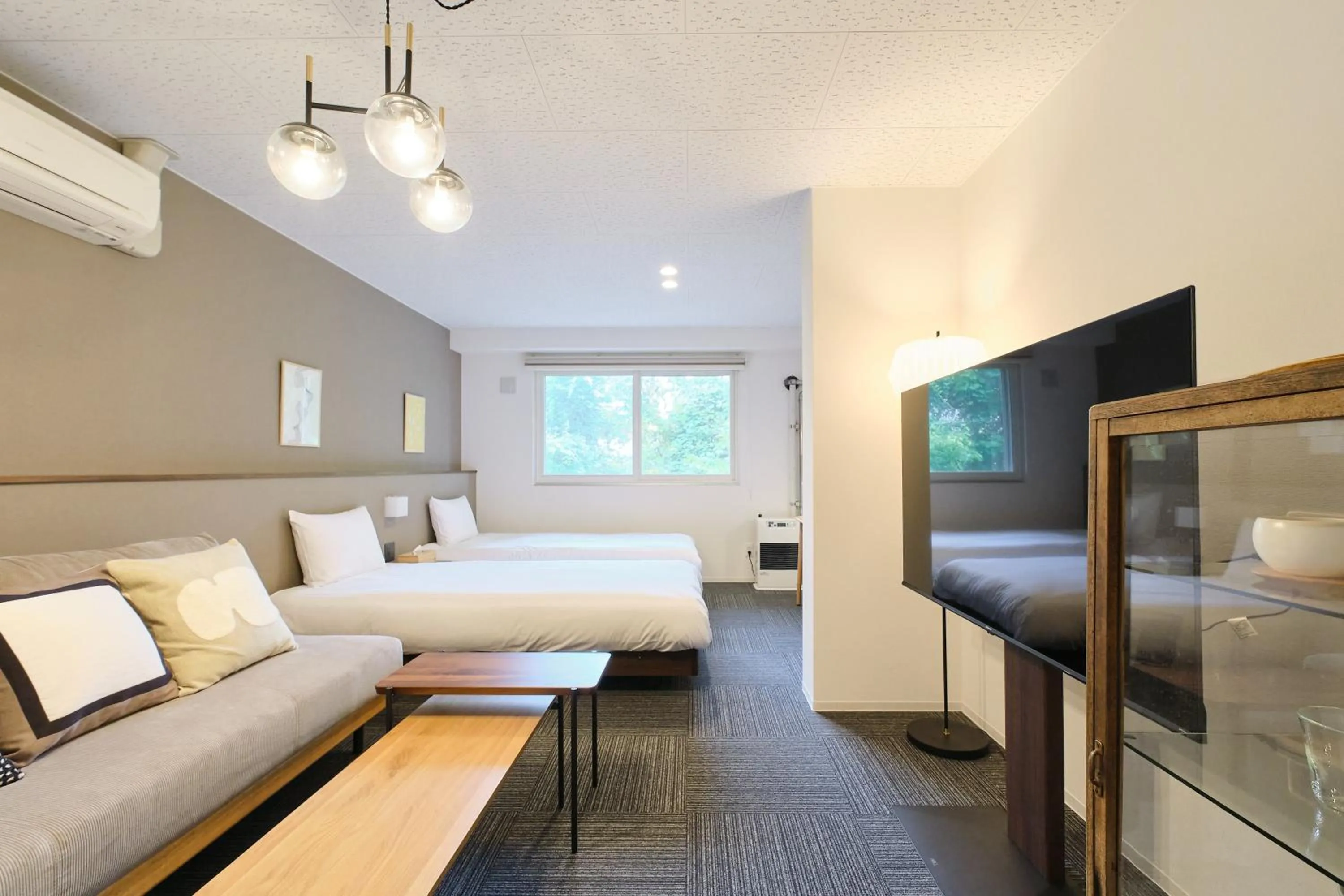 TV and multimedia, Bed in UCHI Living Stay Otaru Suitengu