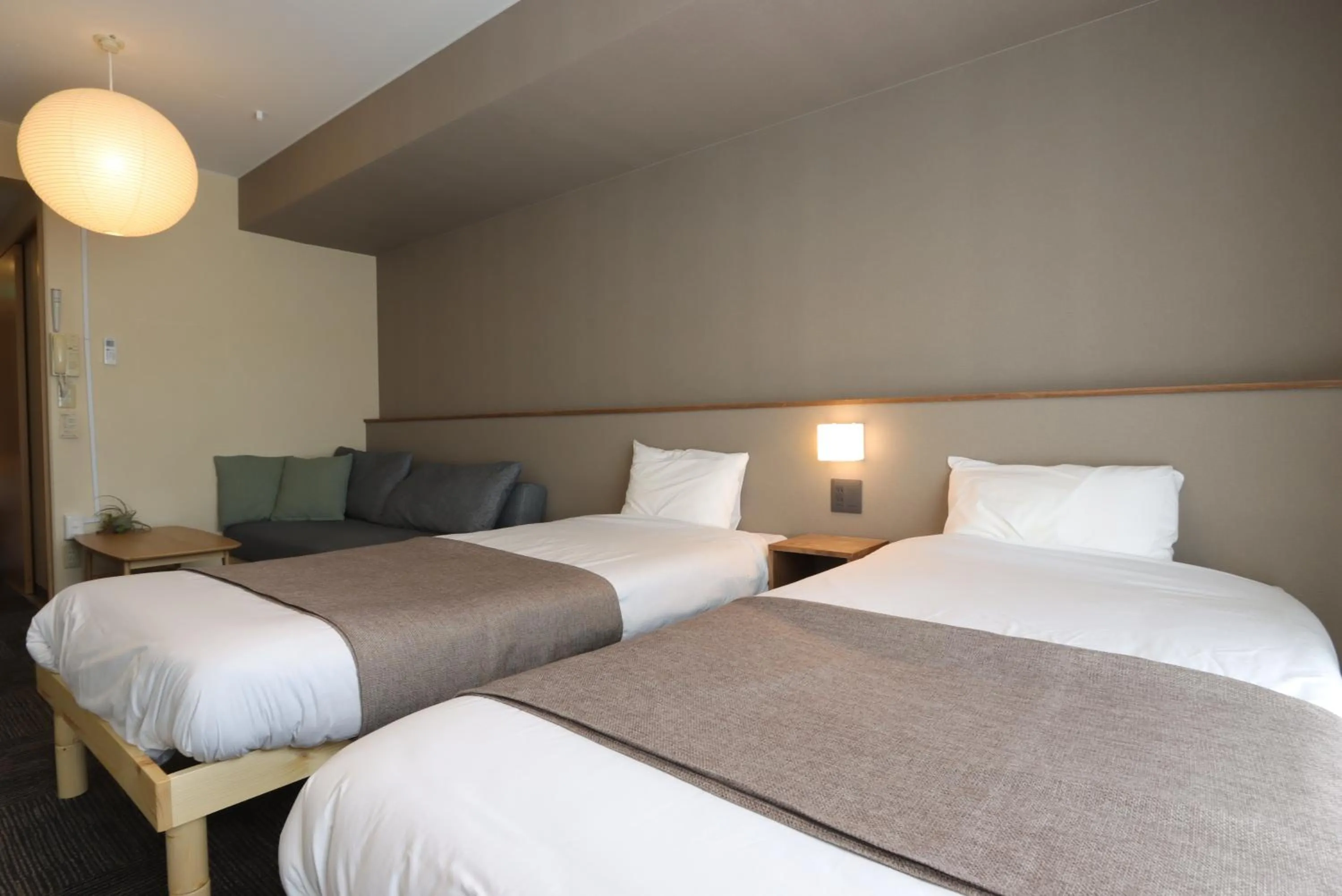 Photo of the whole room, Bed in UCHI Living Stay Otaru Suitengu